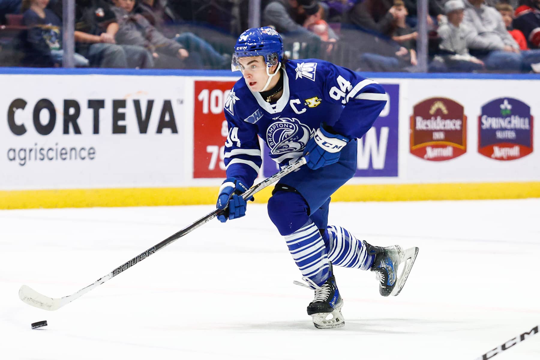 SAGINAW, MI - NOVEMBER 30: Porter Martone #94 of Brampton skates with the puck during a game between Brampton Steelheads and Saginaw Spirit at Dow Event Center on November 30, 2024 in Saginaw, Michigan. (Photo by Michael Miller/ISI Photos/Getty Images)