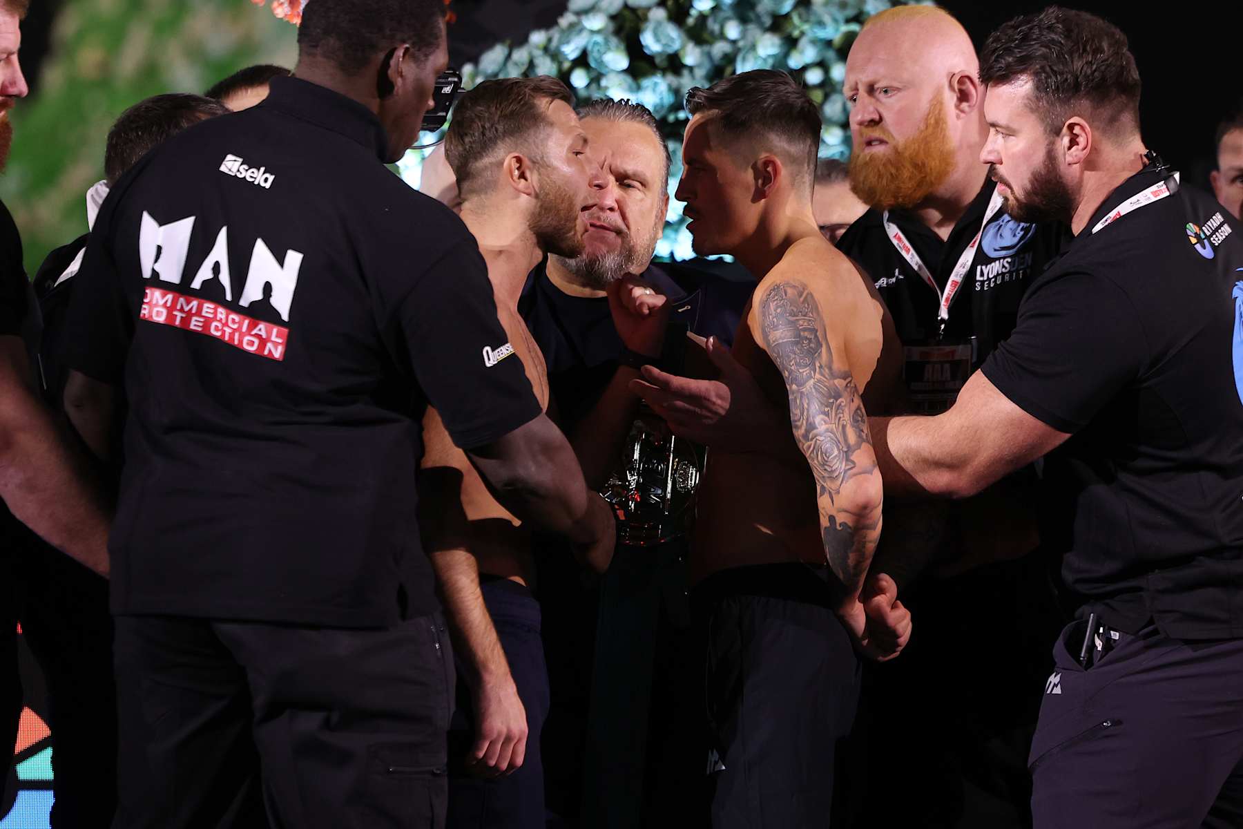 RIYADH, SAUDI ARABIA - DECEMBER 20: Isaac Lowe and Lee McGregor face off during the weigh-in as part of Oleksandr Usyk v Tyson Fury 2 at Wonder Garden on December 20, 2024 in Riyadh, Saudi Arabia. (Photo by Mark Robinson/Getty Images)