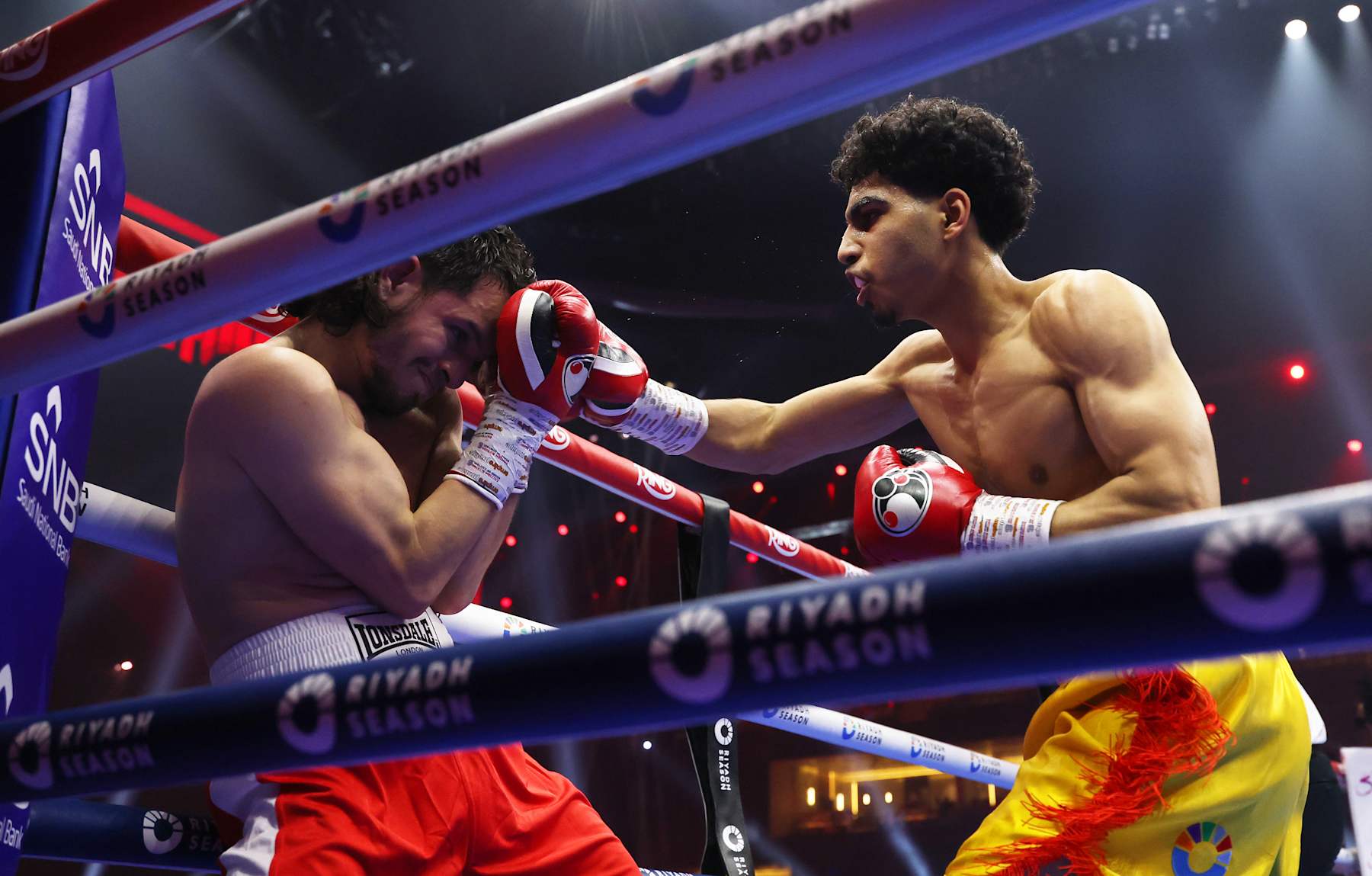 RIYADH, SAUDI ARABIA - DECEMBER 21: Mohammed Alakel punches Joshua Ocampo during the Lightweight fight between Mohammed Alakel and Joshua Ocampo as part of Oleksandr Usyk v Tyson Fury 2, Reignited card at Kingdom Arena on December 21, 2024 in Riyadh, . (Photo by Richard Pelham/Getty Images)