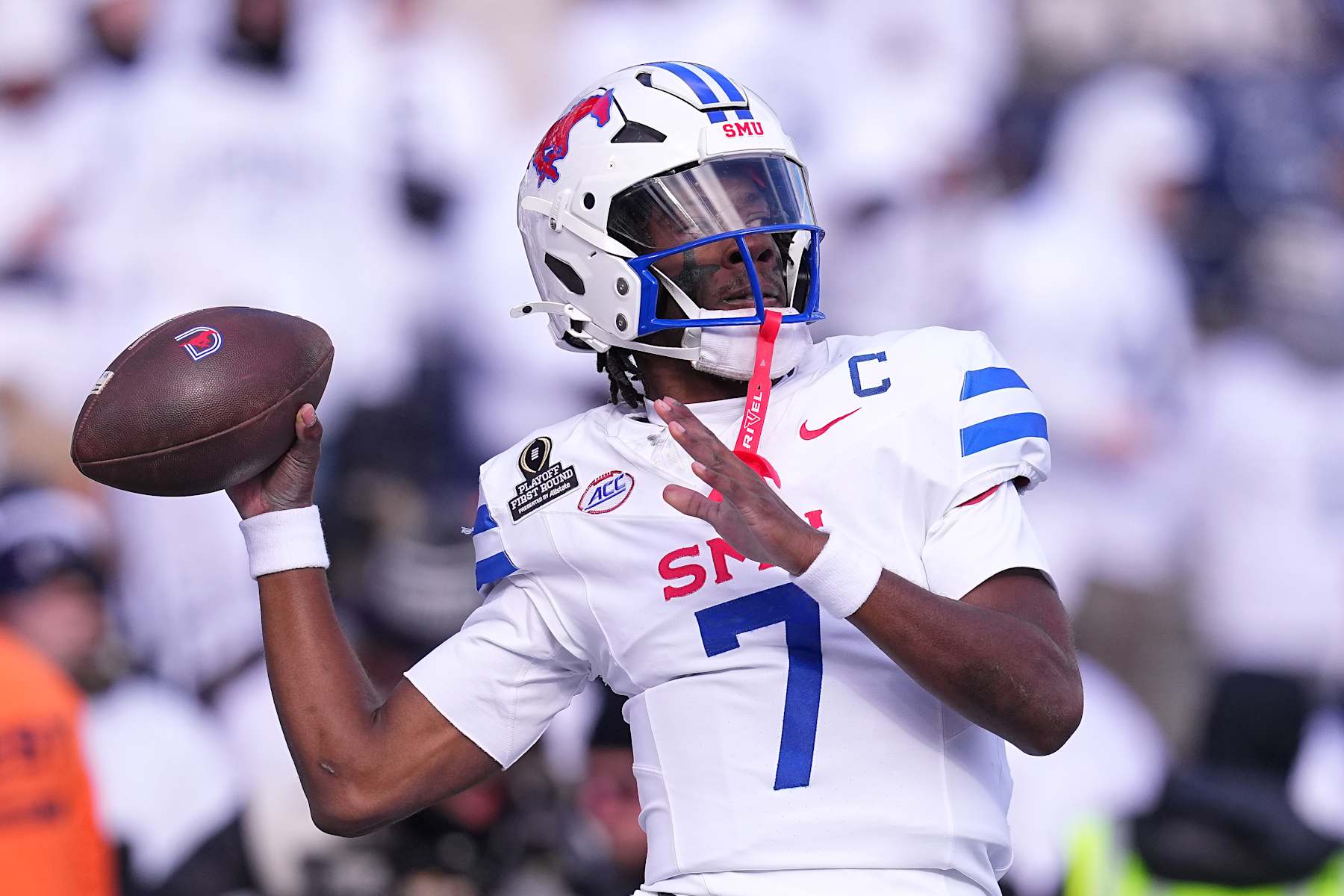 STATE COLLEGE, PENNSYLVANIA - DECEMBER 21: Kevin Jennings #7 of the Southern Methodist Mustangs warms up prior to a game against the Penn State Nittany Lions in the Playoff First Round Game at Beaver Stadium on December 21, 2024 in State College, Pennsylvania. (Photo by Mitchell Leff/Getty Images)