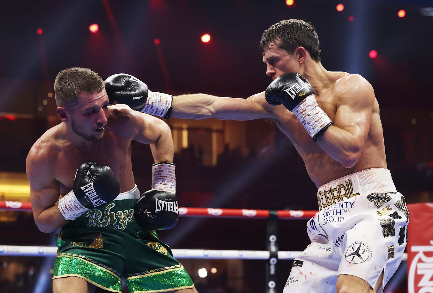 RIYADH, SAUDI ARABIA - DECEMBER 21: Peter McGrail punches Rhys Edwards during the Featherweight fight between Peter McGrail and Rhys Edwards as part of Oleksandr Usyk v Tyson Fury 2, Reignited card at Kingdom Arena on December 21, 2024 in Riyadh, Saudi Arabia. (Photo by Richard Pelham/Getty Images)