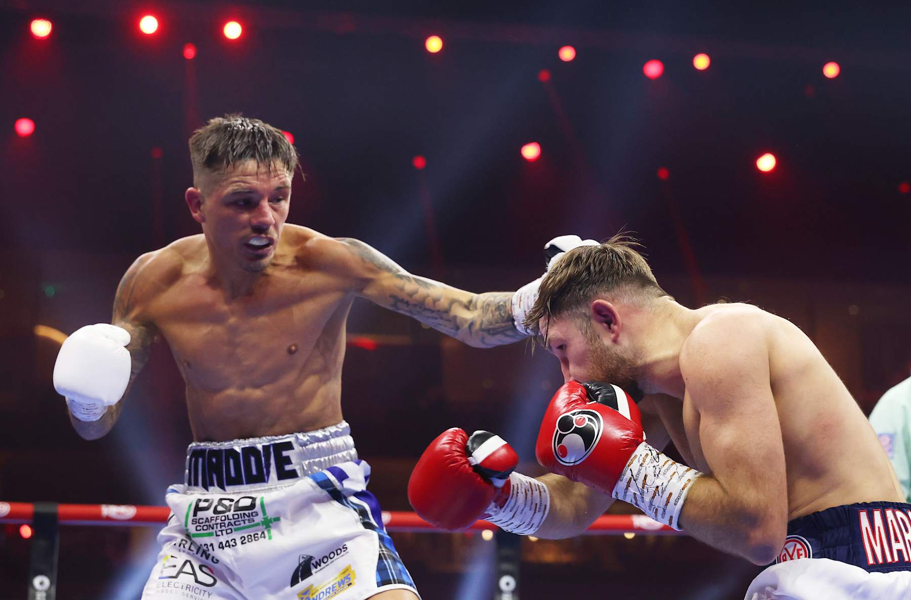 RIYADH, SAUDI ARABIA - DECEMBER 21: Lee McGregor punches Isaac Lowe during the WBC International Featherweight title fight between Isaac Lowe and Lee McGregor as part of Oleksandr Usyk v Tyson Fury 2, Reignited card at Kingdom Arena on December 21, 2024 in Riyadh, Saudi Arabia. (Photo by Richard Pelham/Getty Images)
