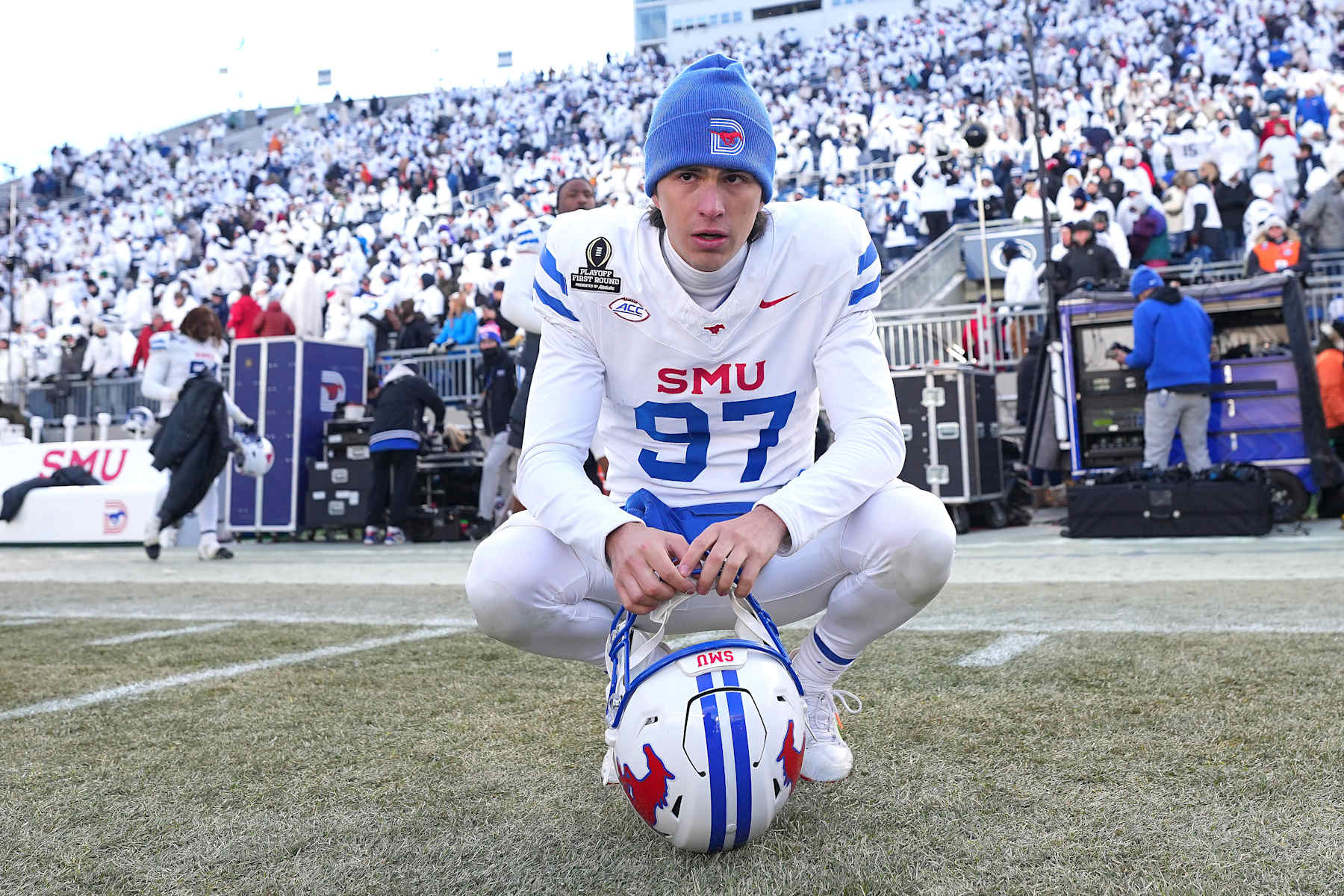 STATE COLLEGE, PENNSYLVANIA - DECEMBER 21: Gabriel Lozano #97 of the Southern Methodist Mustangs reacts after the game against the Penn State Nittany Lions in the Playoff First Round Game at Beaver Stadium on December 21, 2024 in State College, Pennsylvania. Penn State defeated SMU 38-10. (Photo by Mitchell Leff/Getty Images)