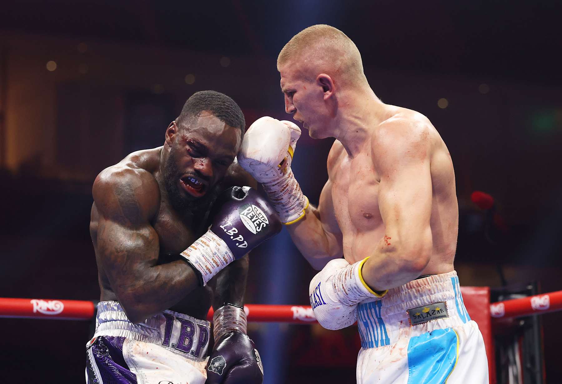 RIYADH, SAUDI ARABIA - DECEMBER 21: Serhii Bohachuk punches Ishmael Davis during the Super Welterweight fight between Serhii Bohachuk and Ishmael Davis as part of Oleksandr Usyk v Tyson Fury 2, Reignited card at Kingdom Arena on December 21, 2024 in Riyadh, Saudi Arabia. (Photo by Richard Pelham/Getty Images)