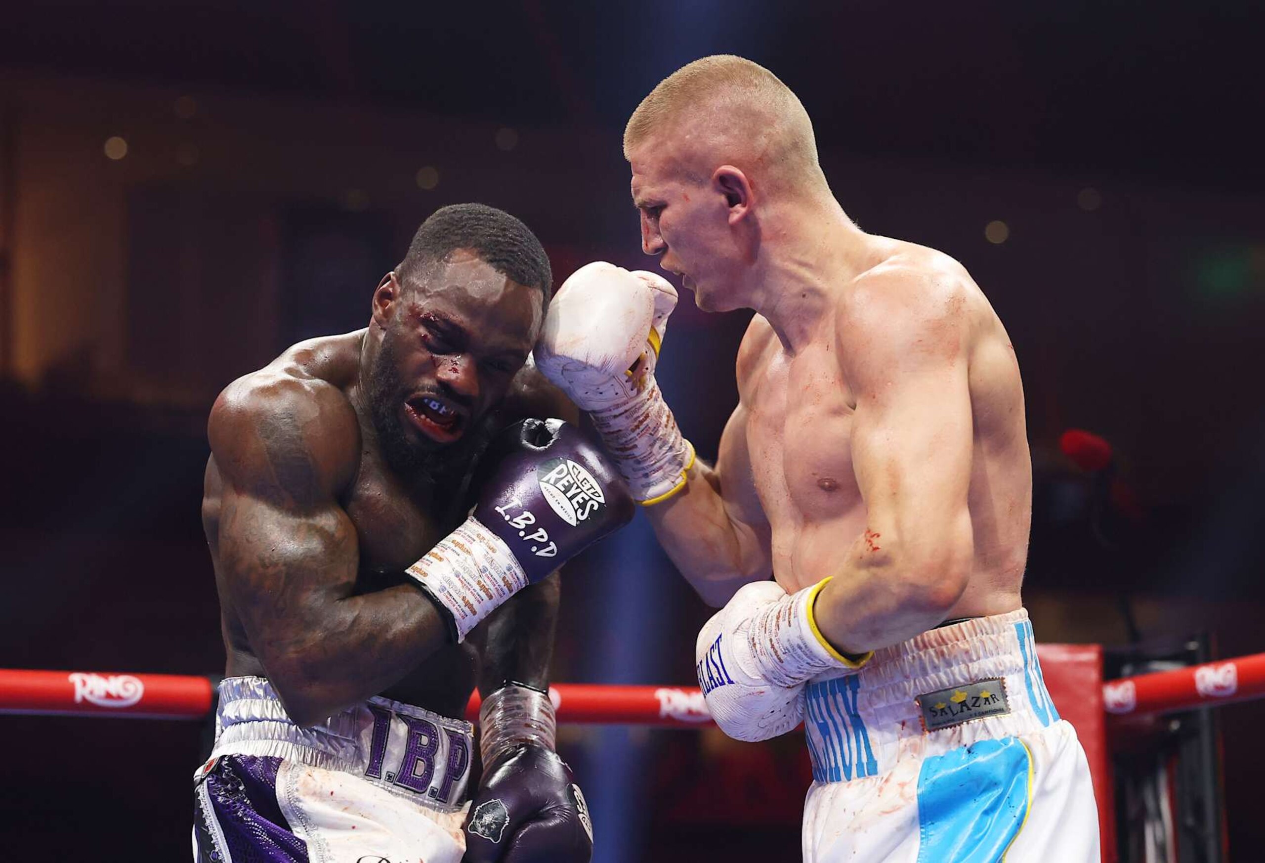 RIYADH, SAUDI ARABIA - DECEMBER 21: Serhii Bohachuk punches Ishmael Davis during the Super Welterweight fight between Serhii Bohachuk and Ishmael Davis as part of Oleksandr Usyk v Tyson Fury 2, Reignited card at Kingdom Arena on December 21, 2024 in Riyadh, Saudi Arabia. (Photo by Richard Pelham/Getty Images)