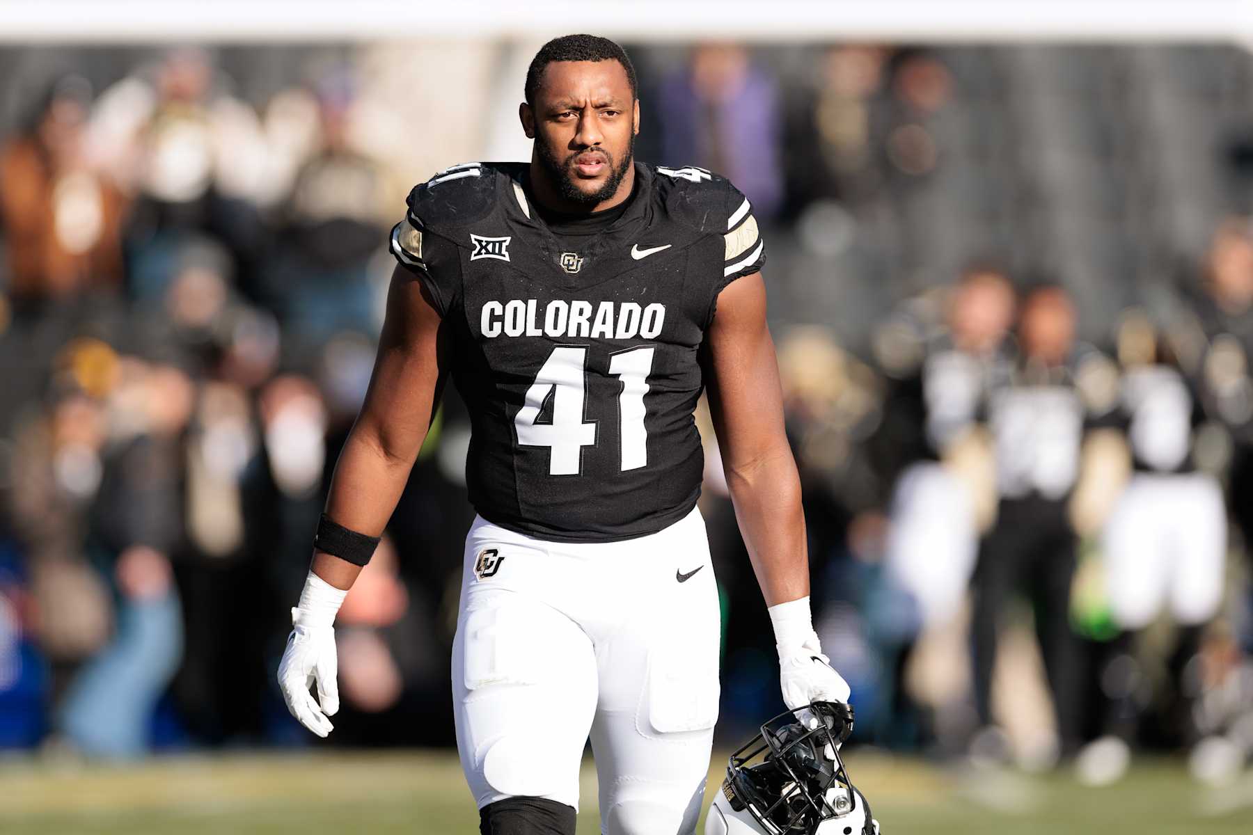 BOULDER, COLORADO - NOVEMBER 29: Nikhai Hill-Green #41 of the Colorado Buffaloes walks onto the field during a senior day celebration prior to the game against the Oklahoma State Cowboys at Folsom Field on November 29, 2024 in Boulder, Colorado. (Photo by Andrew Wevers/Getty Images)