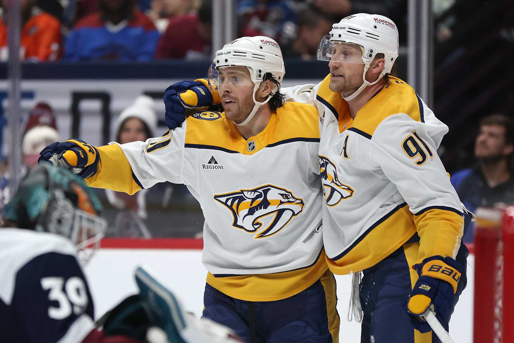 DENVER, COLORADO - DECEMBER 14: Jonathan Marchessault #81 and Steven Stamkos #91 of the Nashville Predators celebrate a goal against the Colorado Avalanche in the third period at Ball Arena on December 14, 2024 in Denver, Colorado. (Photo by Matthew Stockman/Getty Images)