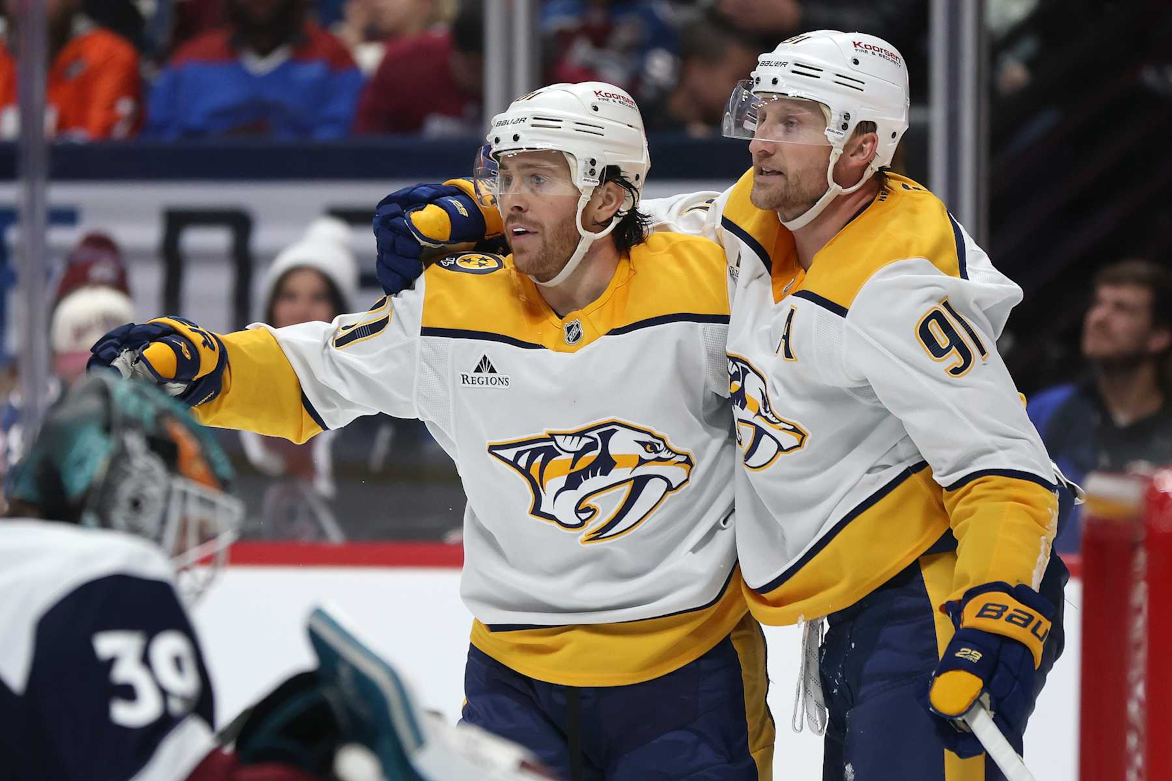 DENVER, COLORADO - DECEMBER 14: Jonathan Marchessault #81 and Steven Stamkos #91 of the Nashville Predators celebrate a goal against the Colorado Avalanche in the third period at Ball Arena on December 14, 2024 in Denver, Colorado. (Photo by Matthew Stockman/Getty Images)