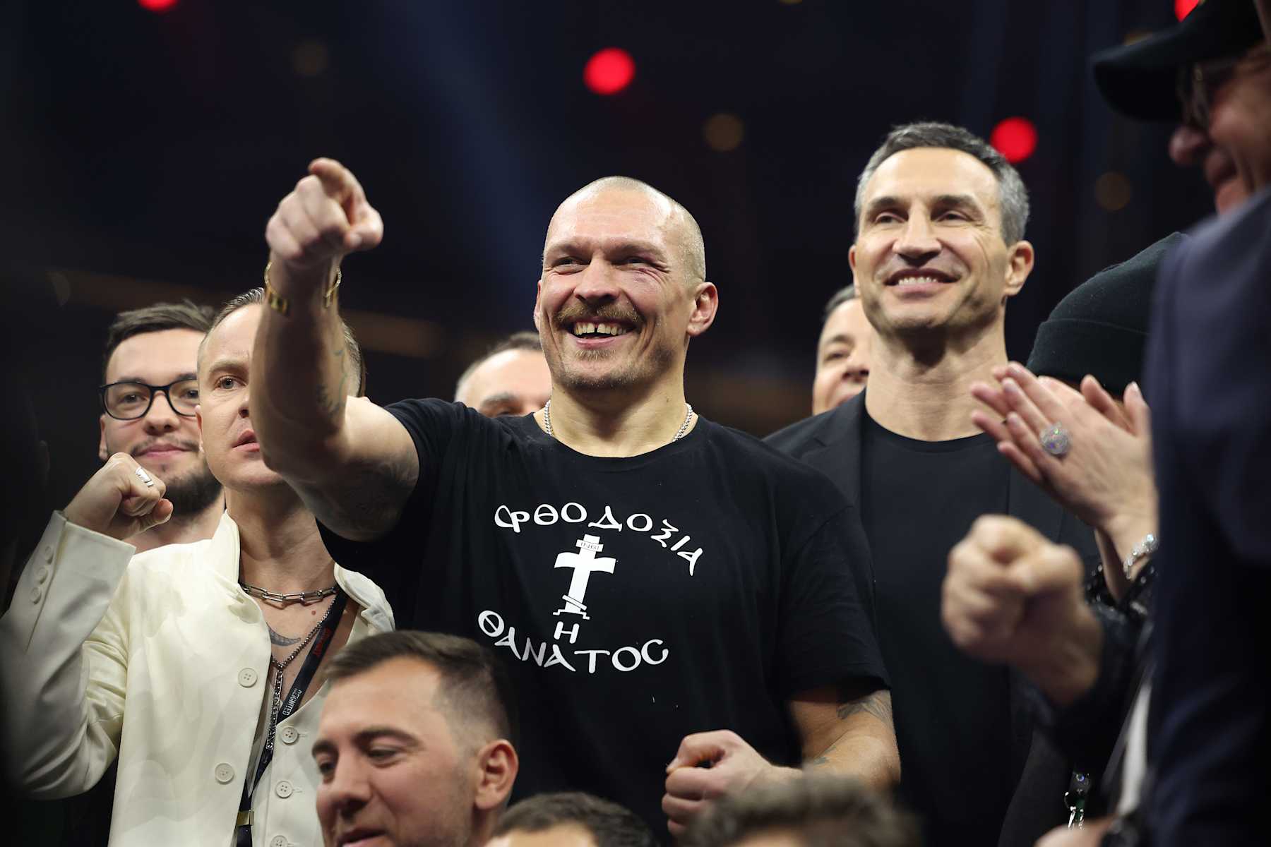 RIYADH, SAUDI ARABIA - DECEMBER 21: Oleksandr Usyk celebrates, with Wladimir Klitschko, after beating Tyson Fury at Kingdom Arena on December 21, 2024 in Riyadh, Saudi Arabia. (Photo by Mark Robinson/Getty Images).