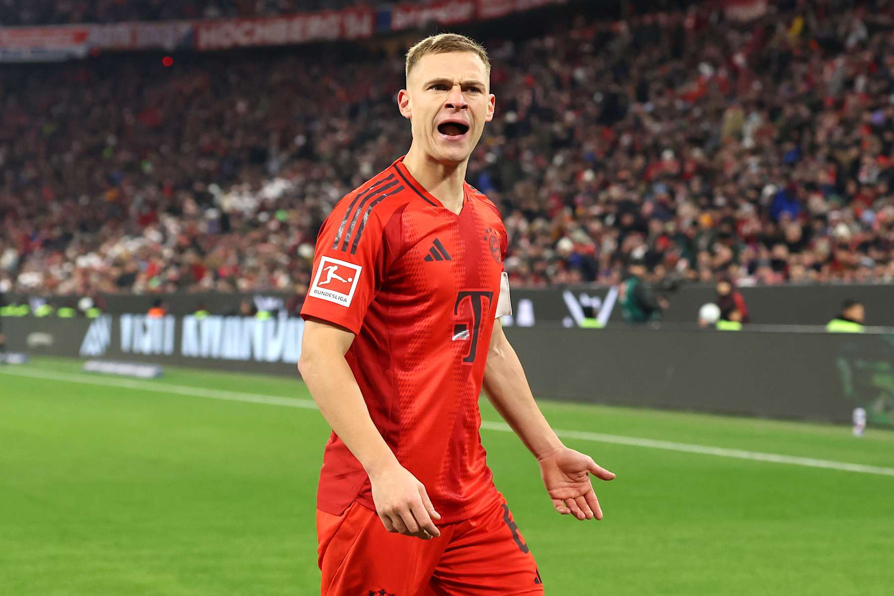 MUNICH, GERMANY - DECEMBER 20: Joshua Kimmich of Bayern Munich reacts during the Bundesliga match between FC Bayern München and RB Leipzig at Allianz Arena on December 20, 2024 in Munich, Germany. (Photo by Alexander Hassenstein/Getty Images)