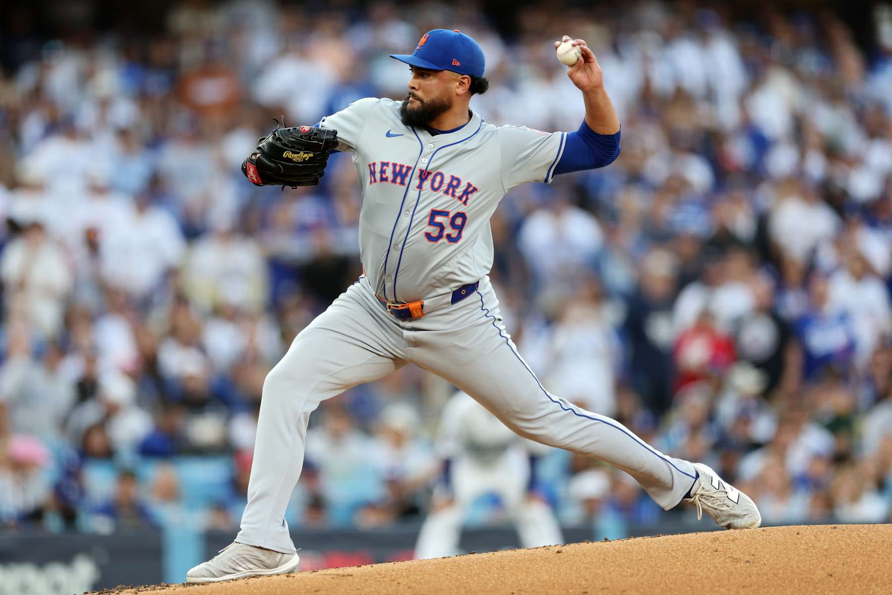 LOS ANGELES, CALIFORNIA - OCTOBER 20:  Starting pitcher Sean Manaea #59 of the New York Mets pitches during Game Six of the National League Championship Series against the Los Angeles Dodgers at Dodger Stadium on October 20, 2024 in Los Angeles, California. (Photo by Harry How/Getty Images)