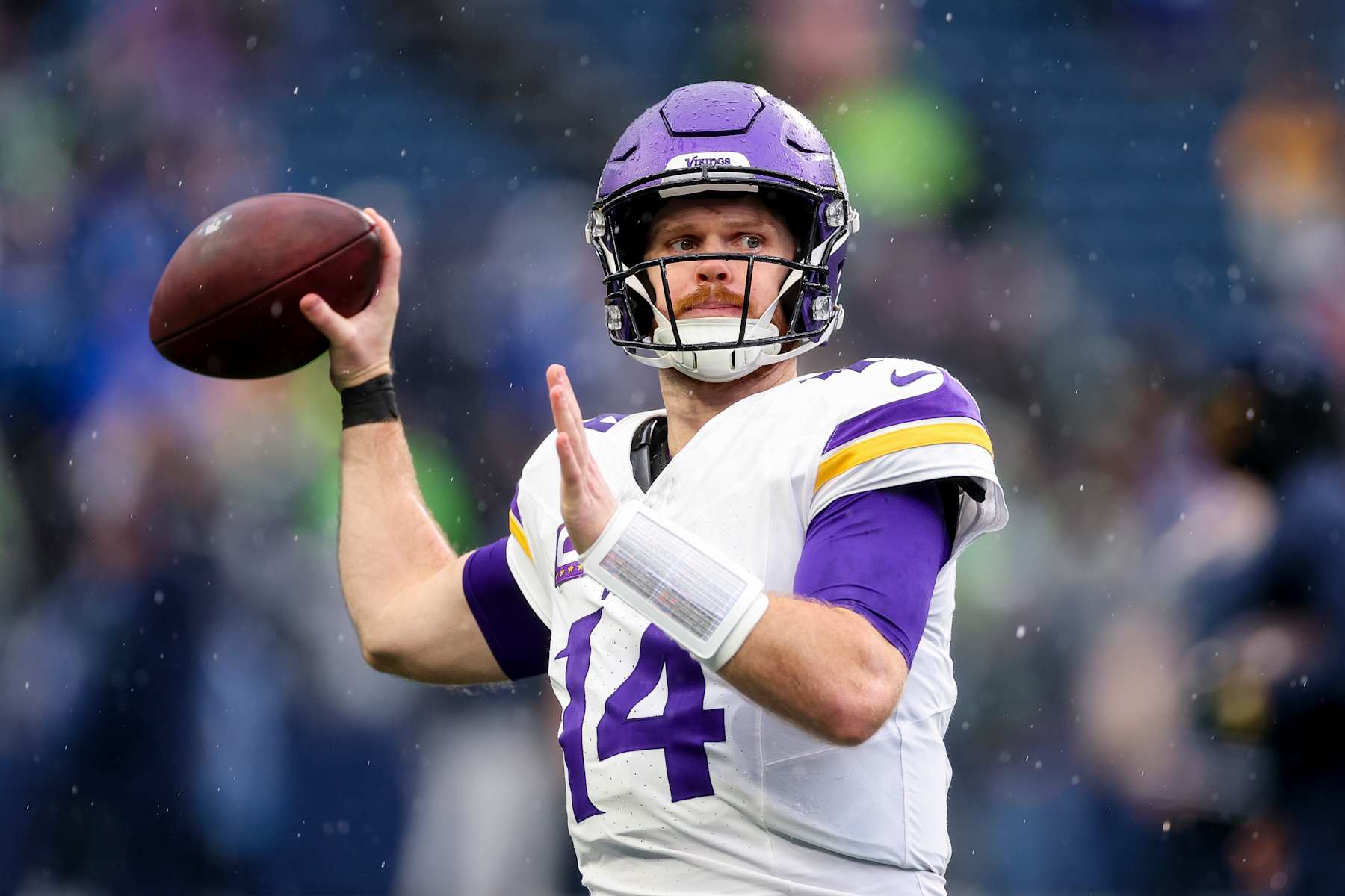 SEATTLE, WASHINGTON - DECEMBER 22: Sam Darnold #14 of the Minnesota Vikings warms up before the game against the Seattle Seahawks at Lumen Field on December 22, 2024 in Seattle, Washington. (Photo by Steph Chambers/Getty Images)