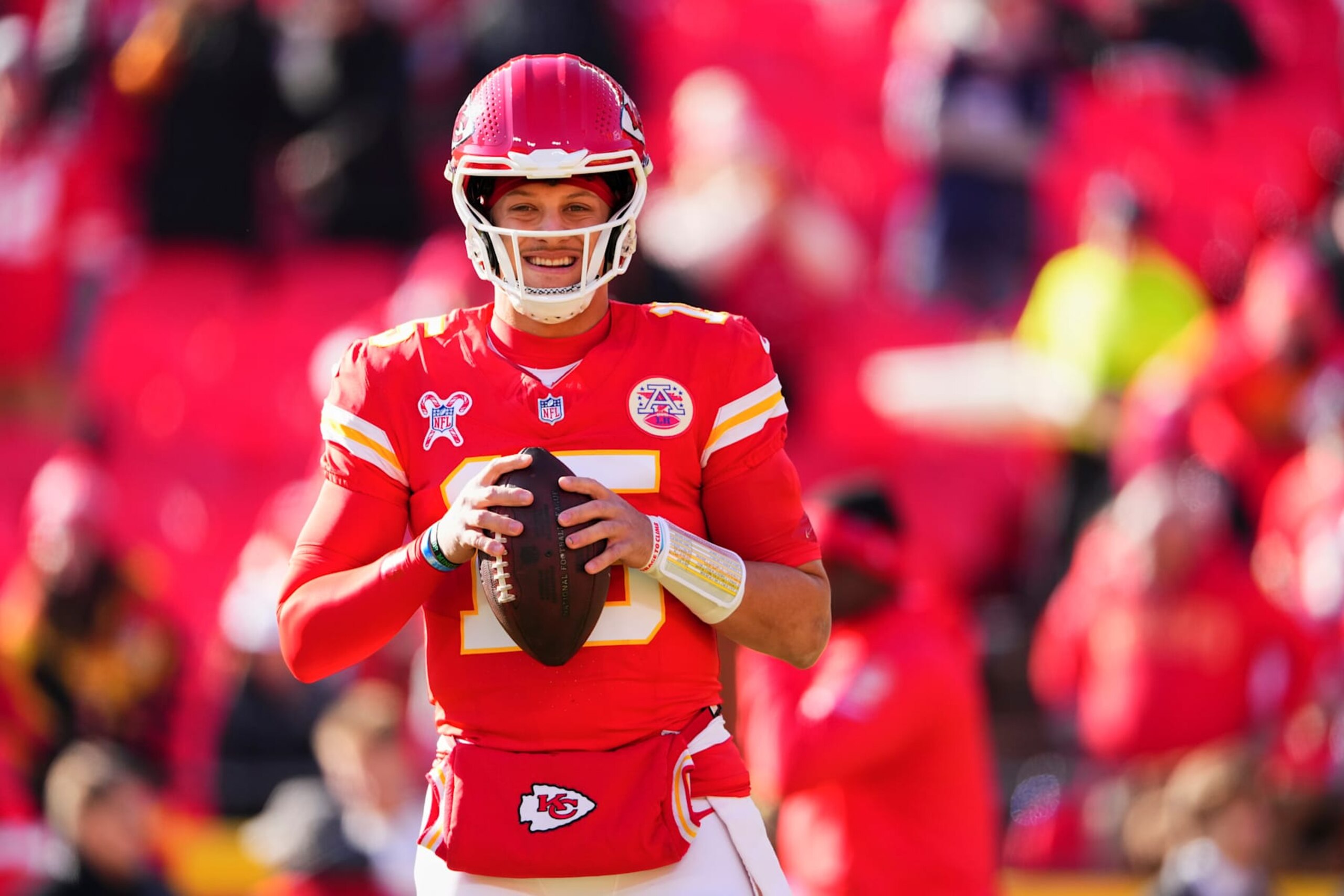 KANSAS CITY, MO - DECEMBER 21: Patrick Mahomes #15 of the Kansas City Chiefs warms up before kickoff against the Houston Texans during an NFL football game at GEHA Field at Arrowhead Stadium on December 21, 2024 in Kansas City, Missouri. (Photo by Cooper Neill/Getty Images)