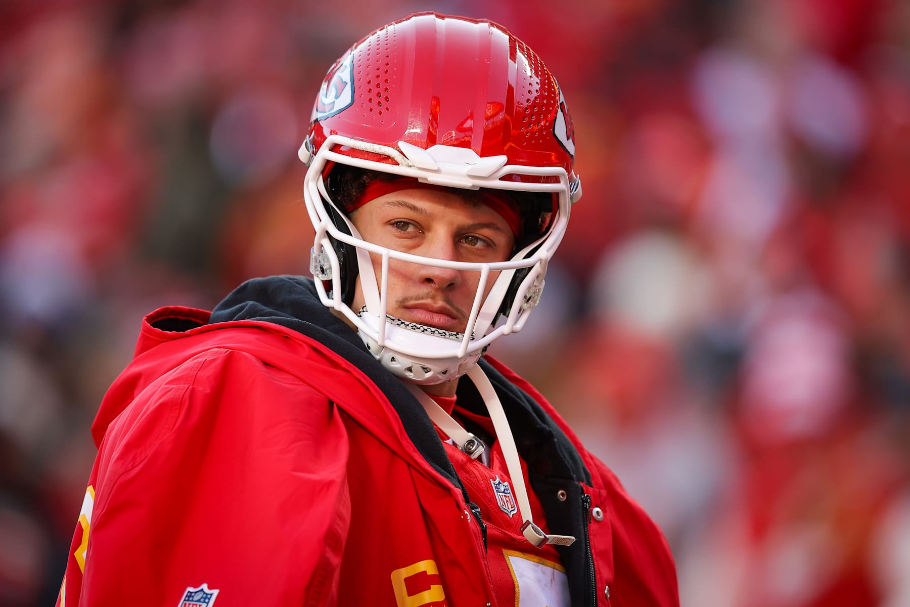 KANSAS CITY, MISSOURI - DECEMBER 21: Patrick Mahomes #15 of the Kansas City Chiefs waits on the field during an injury timeout in the third quarter against the Houston Texans at GEHA Field at Arrowhead Stadium on December 21, 2024 in Kansas City, Missouri. (Photo by David Eulitt/Getty Images)
