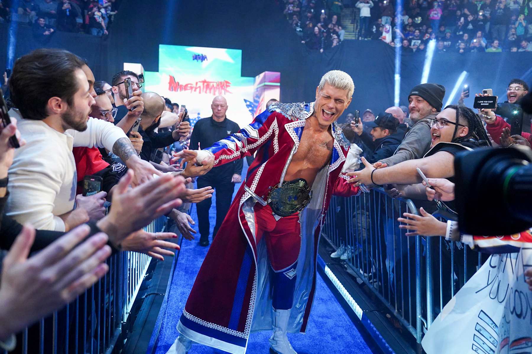 UNIONDALE, NEW YORK - DECEMBER 14: Cody Rhodes enters the arena during Saturday Night Main Event at Nassau Veterans Memorial Coliseum on December 14, 2024 in Uniondale, New York.  (Photo by WWE/Getty Images)