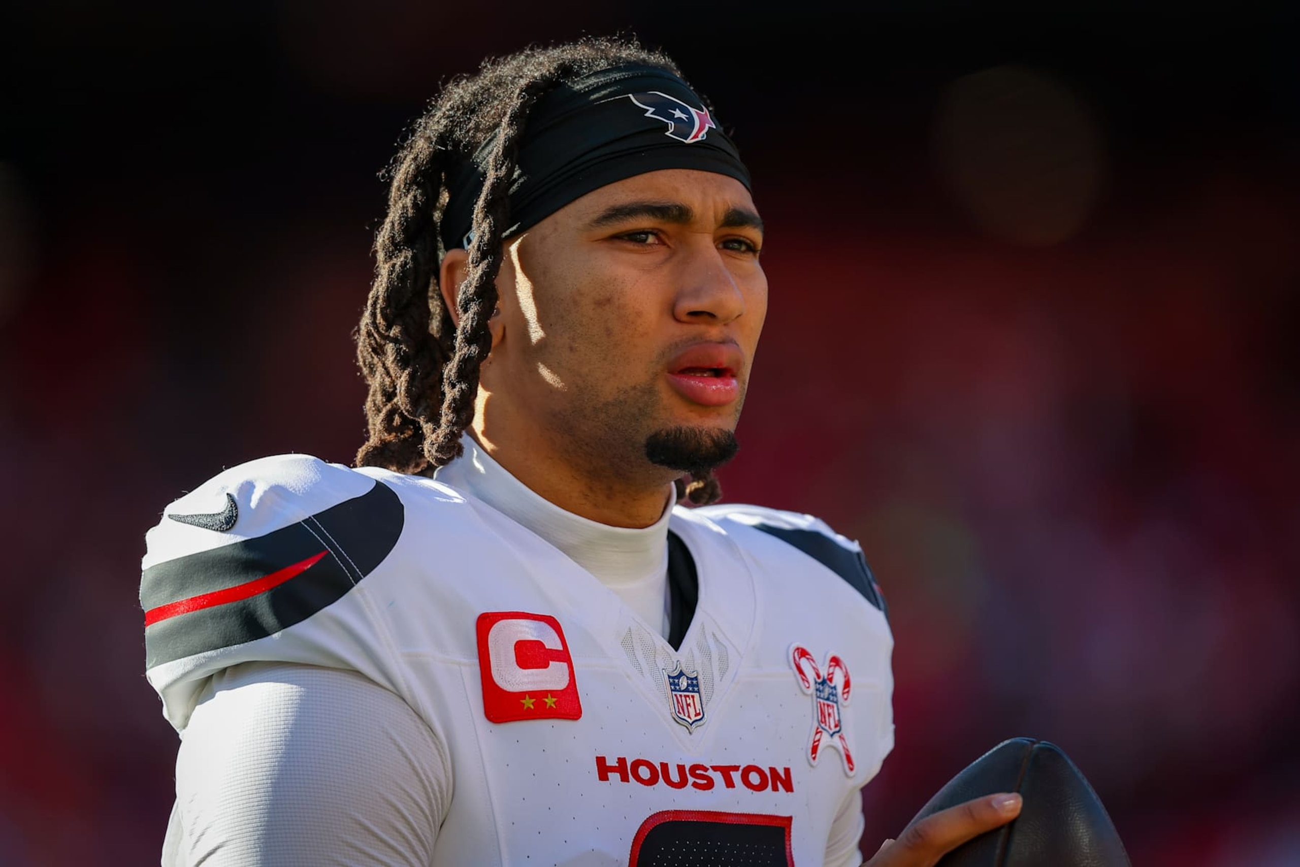 KANSAS CITY, MISSOURI - DECEMBER 21: C.J. Stroud #7 of the Houston Texans warms up prior to the second half against the Kansas City Chiefs at GEHA Field at Arrowhead Stadium on December 21, 2024 in Kansas City, Missouri. (Photo by David Eulitt/Getty Images)