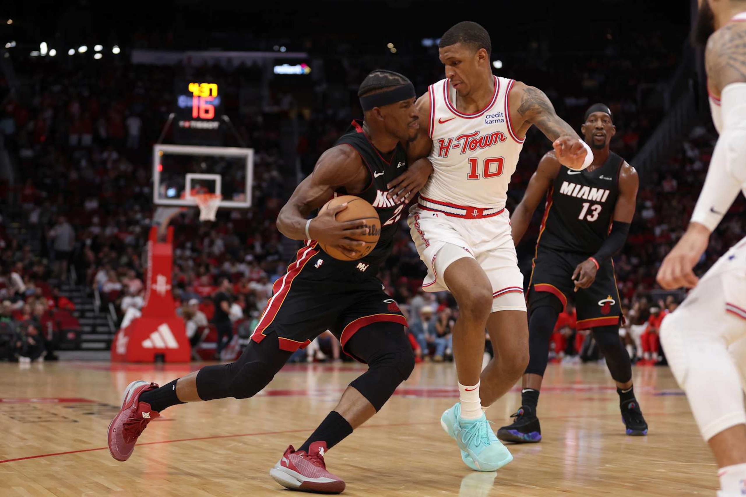 Jimmy Butler and Jabari Smith Jr.