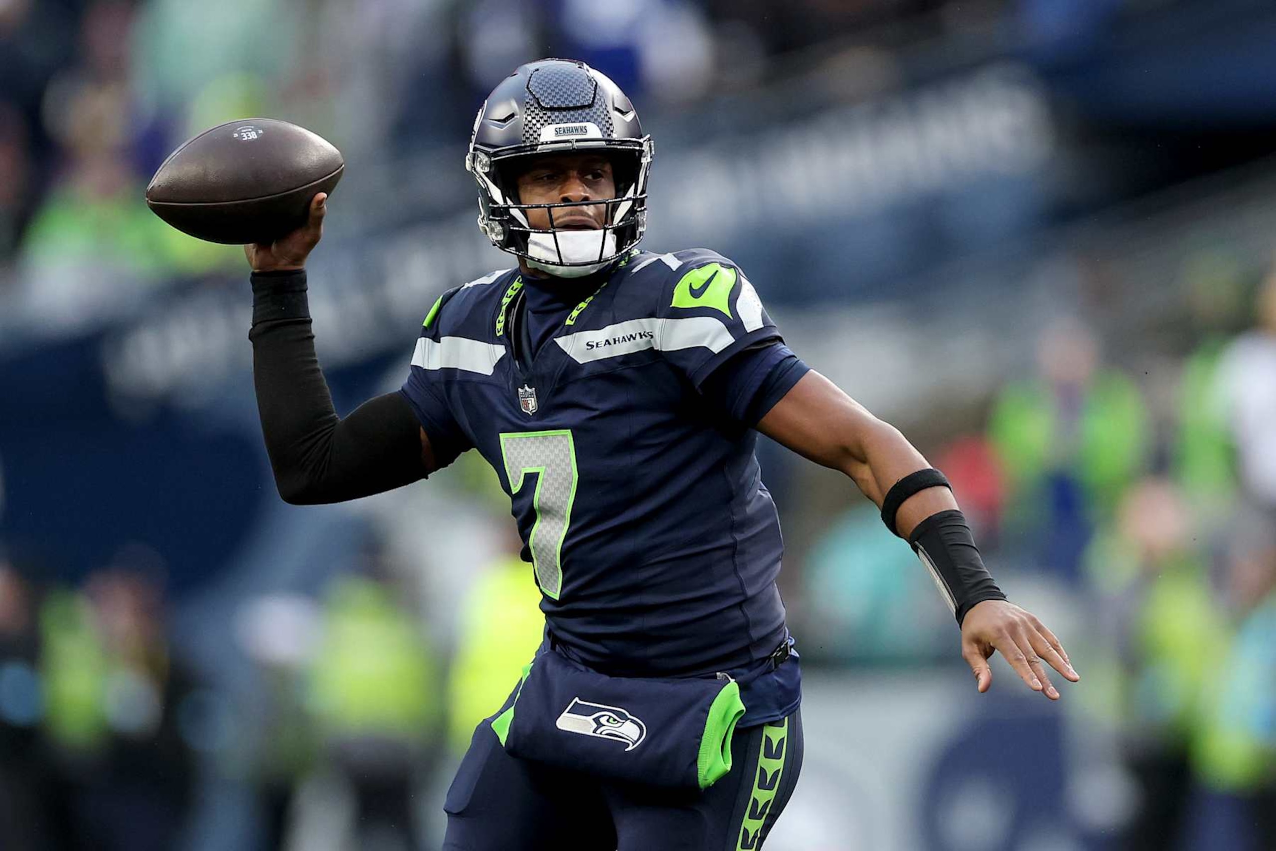 SEATTLE, WASHINGTON - DECEMBER 22: Geno Smith #7 of the Seattle Seahawks looks to pass against the Minnesota Vikings at Lumen Field on December 22, 2024 in Seattle, Washington. (Photo by Steph Chambers/Getty Images)