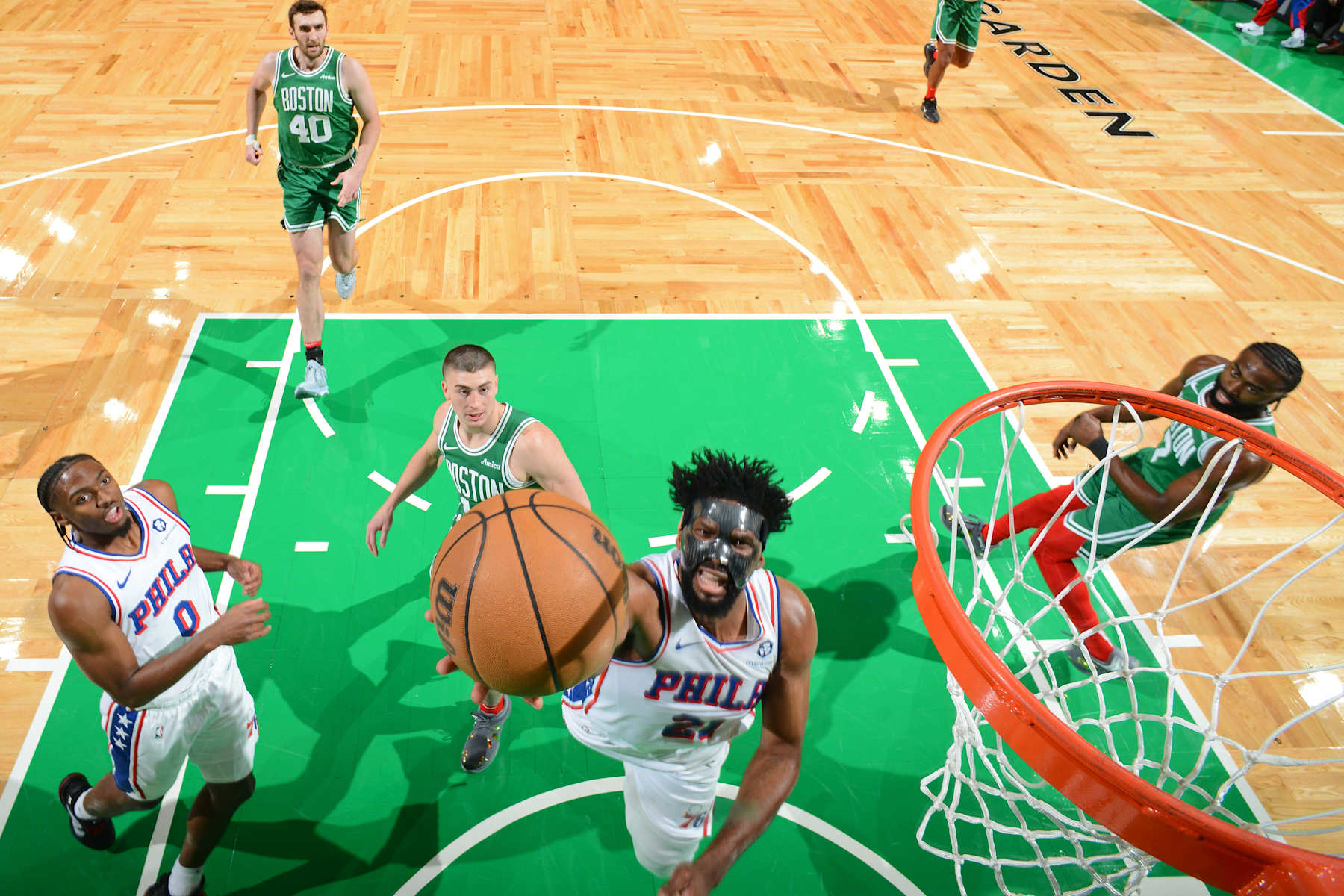 BOSTON, MA - DECEMBER 25: Joel Embiid #21 of the Philadelphia 76ers drives to the basket during the game against the Boston Celtics on December 25, 2024 at the TD Garden in Boston, Massachusetts. NOTE TO USER: User expressly acknowledges and agrees that, by downloading and or using this photograph, User is consenting to the terms and conditions of the Getty Images License Agreement. Mandatory Copyright Notice: Copyright 2024 NBAE(Photo by Brian Babineau/NBAE via Getty Images)