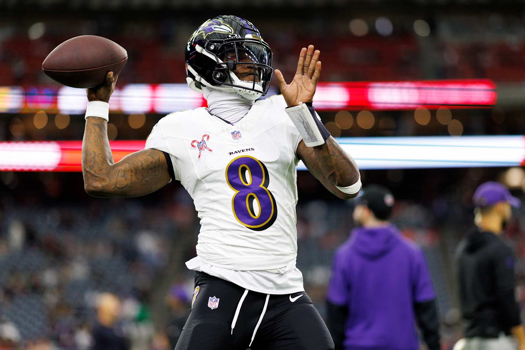 HOUSTON, TEXAS - DECEMBER 25: Quarterback Lamar Jackson #8 of the Baltimore Ravens warms up prior to an NFL football game against the Houston Texans, at NRG Stadium on December 25, 2024 in Houston, Texas. (Photo by Brooke Sutton/Getty Images)