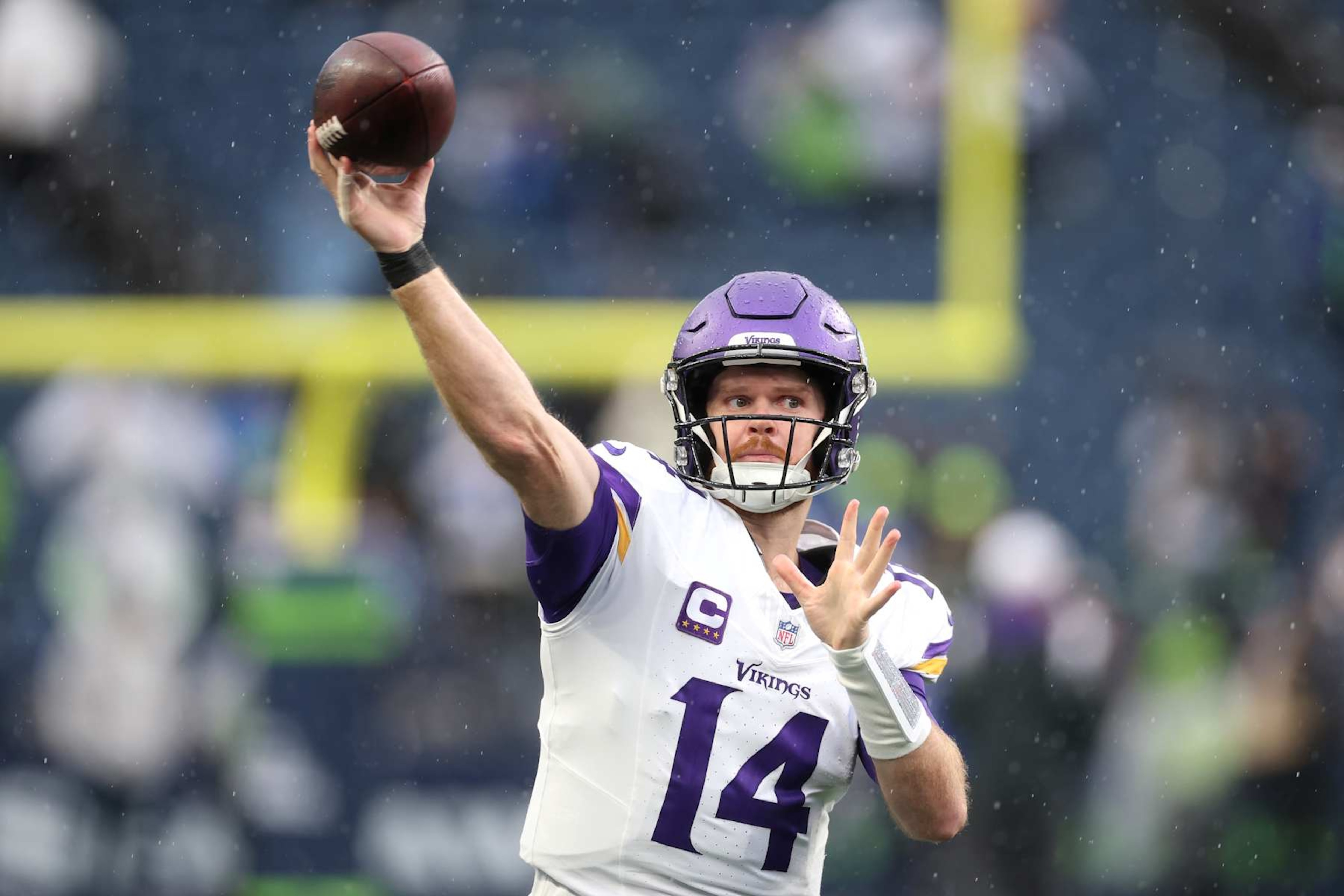 SEATTLE, WASHINGTON - DECEMBER 22: Sam Darnold #14 of the Minnesota Vikings warms up before the game against the Seattle Seahawks at Lumen Field on December 22, 2024 in Seattle, Washington. (Photo by Steph Chambers/Getty Images)