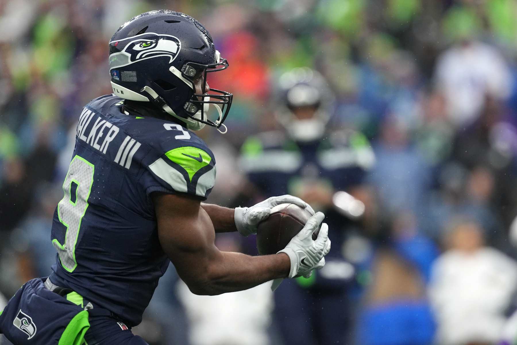 SEATTLE, WASHINGTON - DECEMBER 22: Kenneth Walker III #9 of the Seattle Seahawks catches a pass against the Minnesota Vikings during the second quarter at Lumen Field on December 22, 2024 in Seattle, Washington. (Photo by Christopher Mast/Getty Images)