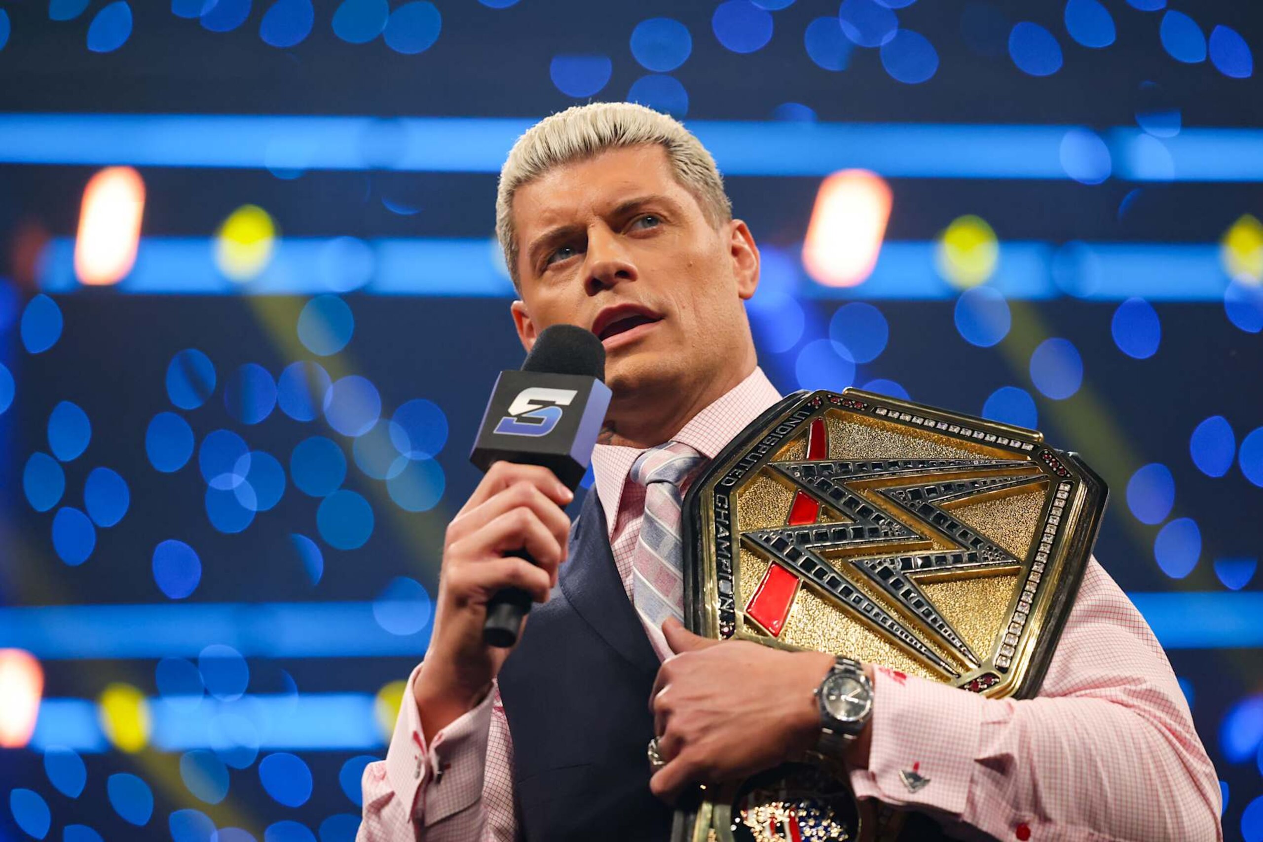 COLUMBIA, SOUTH CAROLINA - OCTOBER 18: Cody Rhodes speaks to the WWE Universe with the Undisputed WWE Championship belt over his shoulder during SmackDown at Colonial Life Arena on October 18, 2024 in Columbia, South Carolina.  (Photo by WWE/Getty Images)