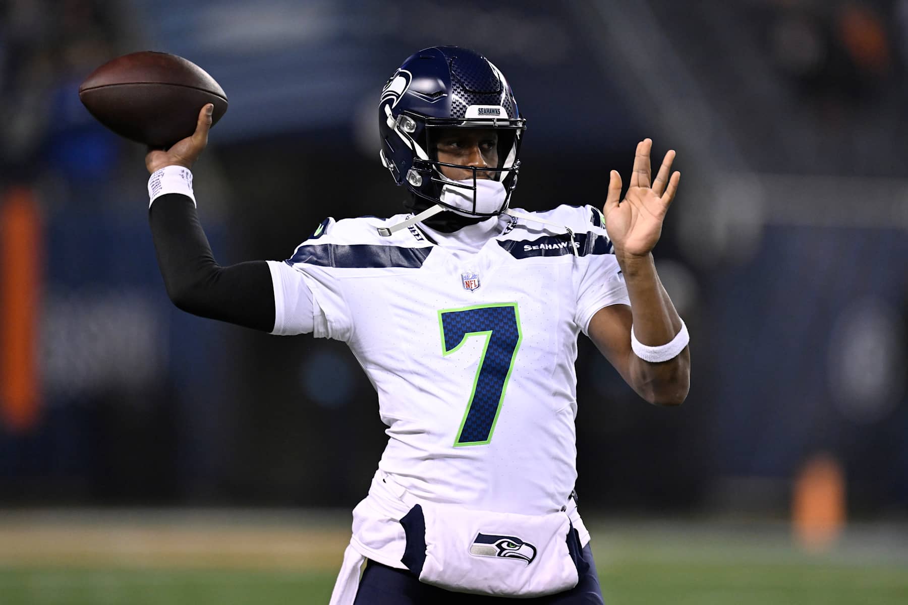 CHICAGO, ILLINOIS - DECEMBER 26: Geno Smith #7 of the Seattle Seahawks warms up prior to the game against the Chicago Bears at Soldier Field on December 26, 2024 in Chicago, Illinois. (Photo by Quinn Harris/Getty Images)