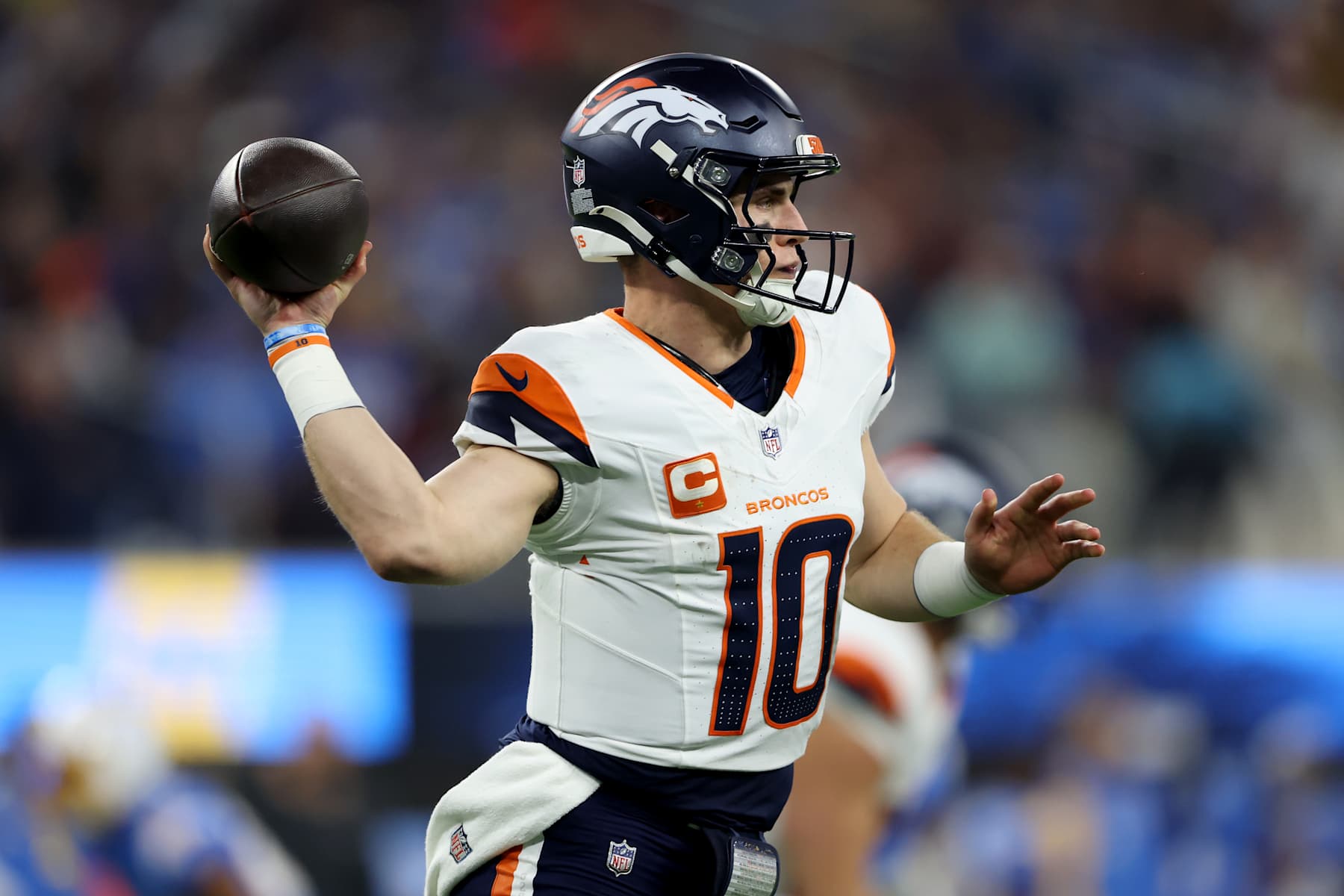INGLEWOOD, CALIFORNIA - DECEMBER 19: Bo Nix #10 of the Denver Broncos throws a pass against the Los Angeles Chargers during the second quarter in the game at SoFi Stadium on December 19, 2024 in Inglewood, California. (Photo by Sean M. Haffey/Getty Images)