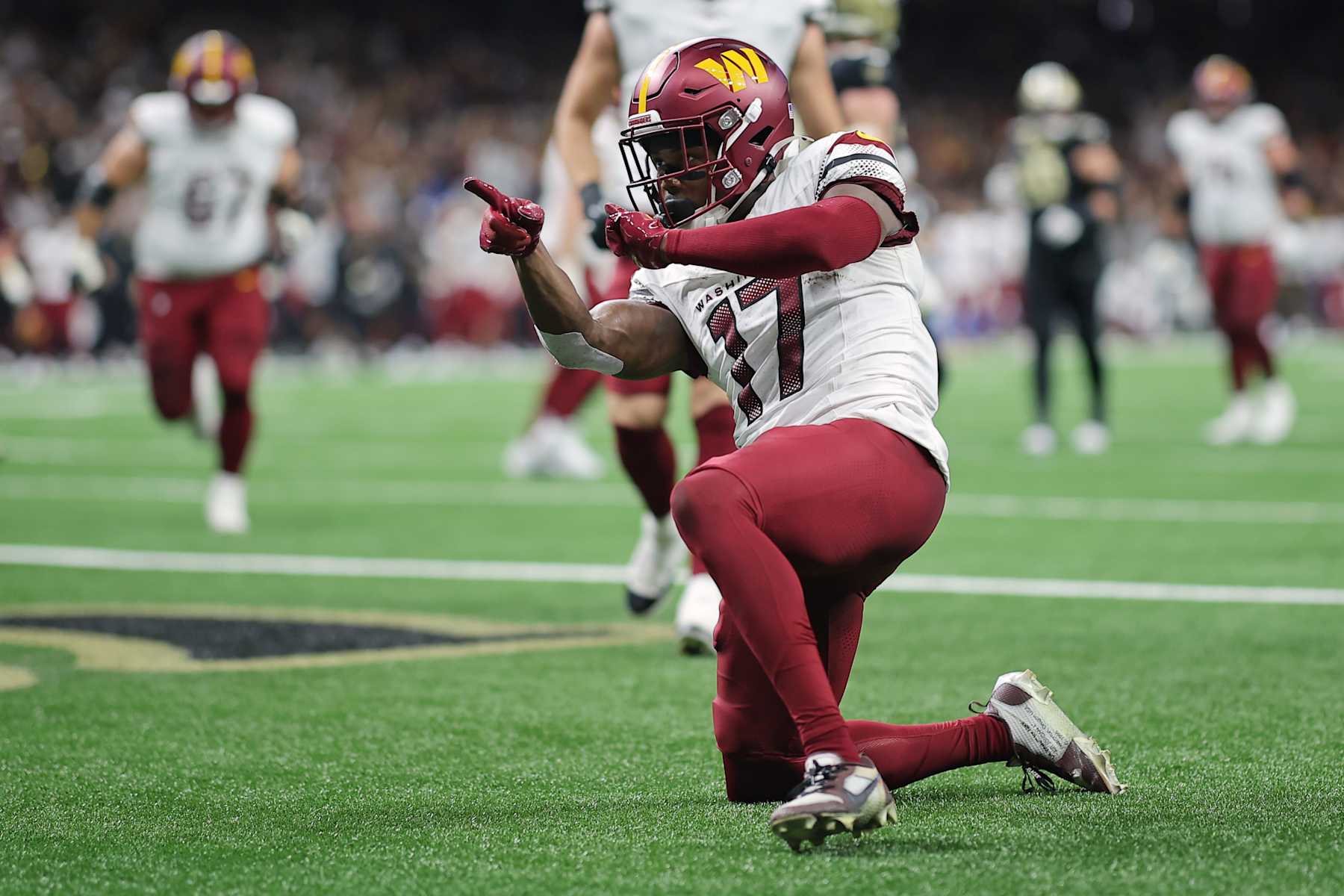 NEW ORLEANS, LOUISIANA - DECEMBER 15: Terry McLaurin #17 of the Washington Commanders reacts after a touchdown during the second quarter against the New Orleans Saints at Caesars Superdome on December 15, 2024 in New Orleans, Louisiana. (Photo by Jonathan Bachman/Getty Images)