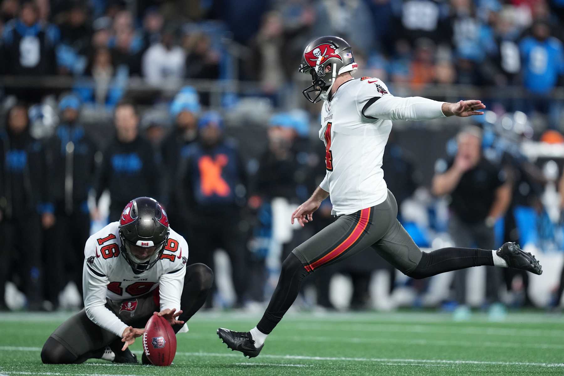 CHARLOTTE, NORTH CAROLINA - DECEMBER 01: Chase McLaughlin #4 of the Tampa Bay Buccaneers kicks a field goal during the second quarter against the Carolina Panthers at Bank of America Stadium on December 01, 2024 in Charlotte, North Carolina. (Photo by Grant Halverson/Getty Images)