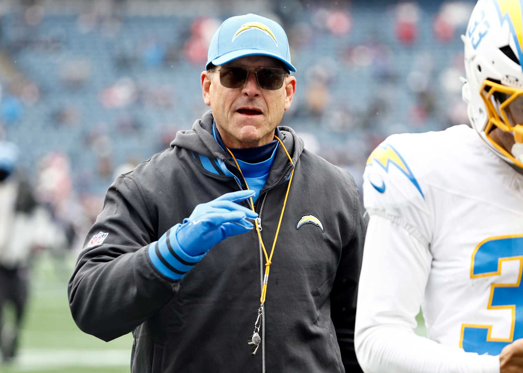 FOXBOROUGH, MASSACHUSETTS - DECEMBER 28: Head coach Jim Harbaugh of the Los Angeles Chargers is seen on the field prior to a game against the New England Patriots at Gillette Stadium on December 28, 2024 in Foxborough, Massachusetts. (Photo by Winslow Townson/Getty Images)