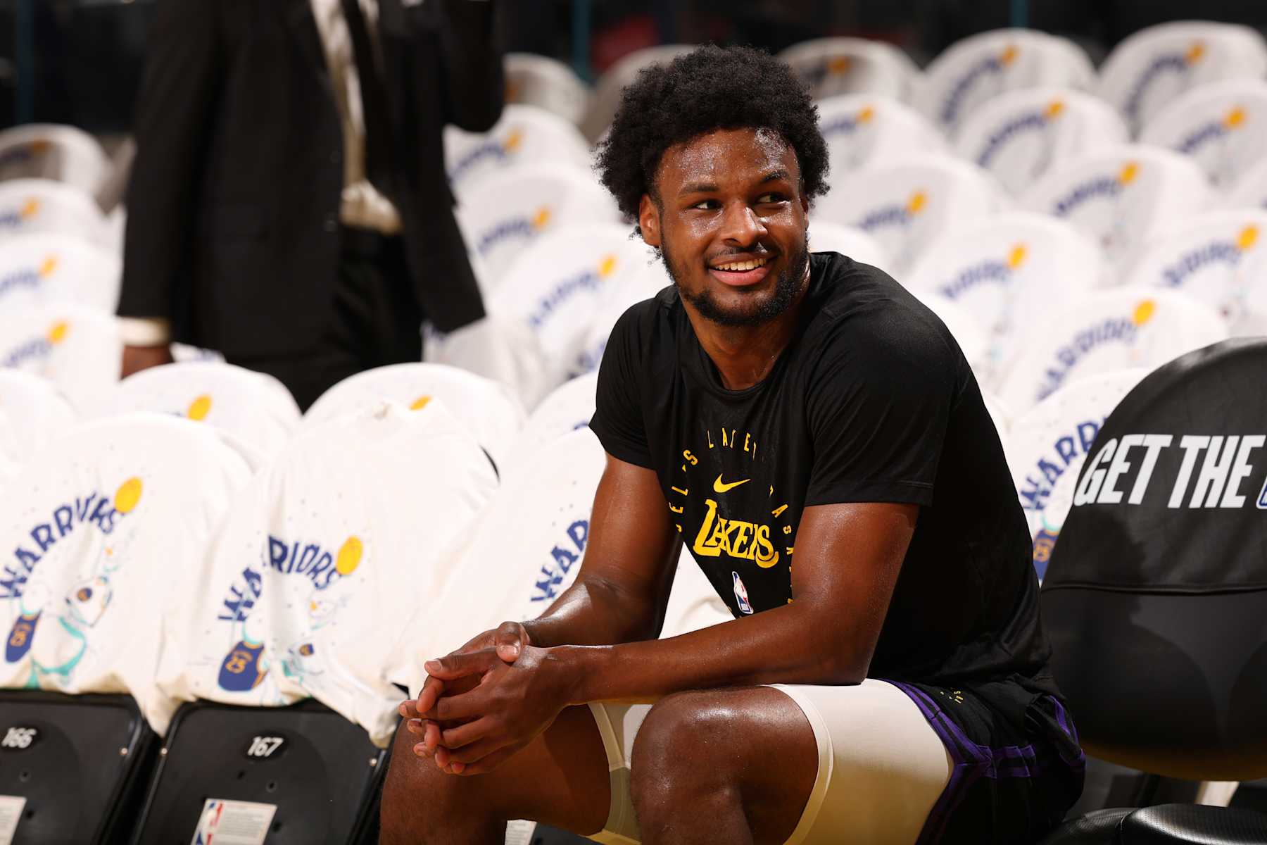 SAN FRANCISCO, CA - DECEMBER 25: Bronny James #9 of the Los Angeles Lakers looks on before the game against the Golden State Warriors on December 25, 2024 at Chase Center in San Francisco, California. NOTE TO USER: User expressly acknowledges and agrees that, by downloading and or using this photograph, user is consenting to the terms and conditions of Getty Images License Agreement. Mandatory Copyright Notice: Copyright 2024 NBAE (Photo by Jed Jacobsohn/NBAE via Getty Images)