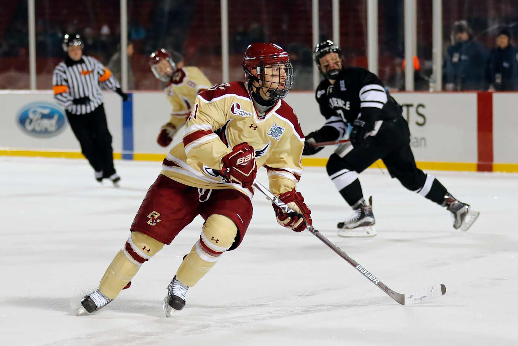 BOSTON, MA - JANUARY 08: Boston College Eagles forward Matthew Gaudreau (21) works the forecheck during a Frozen Fenway NCAA Men's Division 1 hockey game between the Boston College Eagles and the Providence College Friars on January 8, 2017 at Fenway Park in Boston, Massachusetts. The Eagles defeated the Friars 3-1. (Photo by Fred Kfoury III/Icon Sportswire via Getty Images)