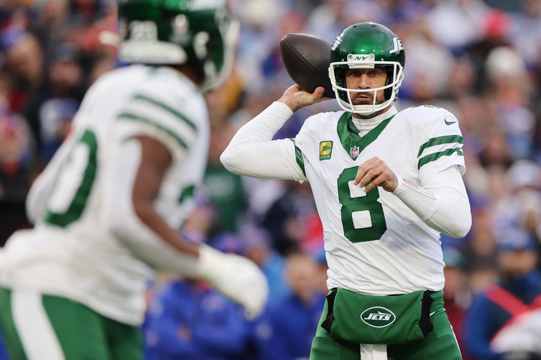 ORCHARD PARK, NEW YORK - DECEMBER 29: Aaron Rodgers #8 of the New York Jets throws a pass during the first quarter against the Buffalo Bills at Highmark Stadium on December 29, 2024 in Orchard Park, New York. (Photo by Bryan M. Bennett/Getty Images)