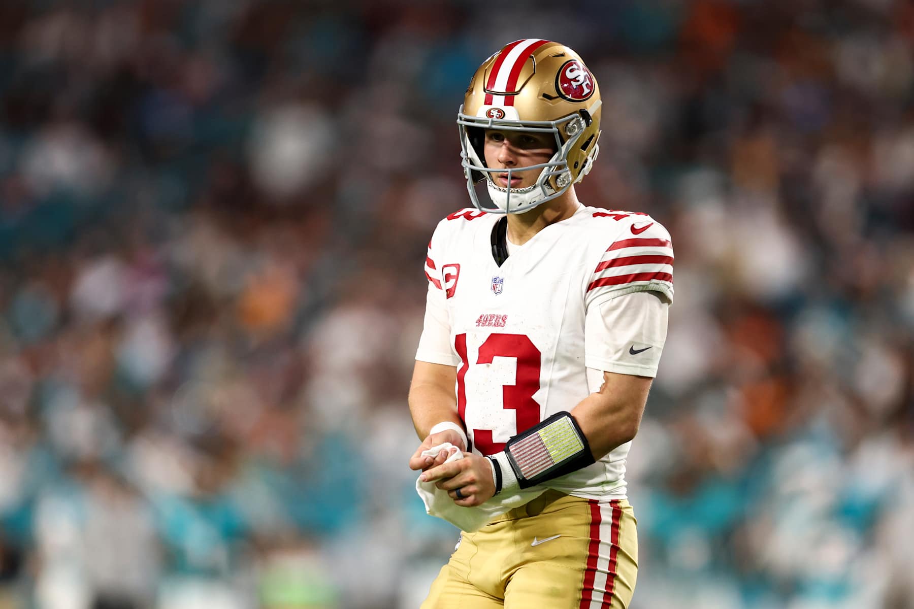 MIAMI GARDENS, FLORIDA - DECEMBER 22: Brock Purdy #13 of the San Francisco 49ers reacts during the second half of an NFL football game against the Miami Dolphins at Hard Rock Stadium on December 22, 2024 in Miami Gardens, Florida. (Photo by Kevin Sabitus/Getty Images)