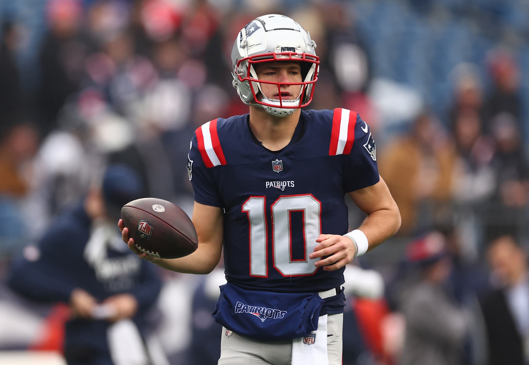 FOXBOROUGH, MASSACHUSETTS - DECEMBER 28: Drake Maye #10 of the New England Patriots warms up prior to a game against the Los Angeles Chargers at Gillette Stadium on December 28, 2024 in Foxborough, Massachusetts. (Photo by Maddie Meyer/Getty Images)