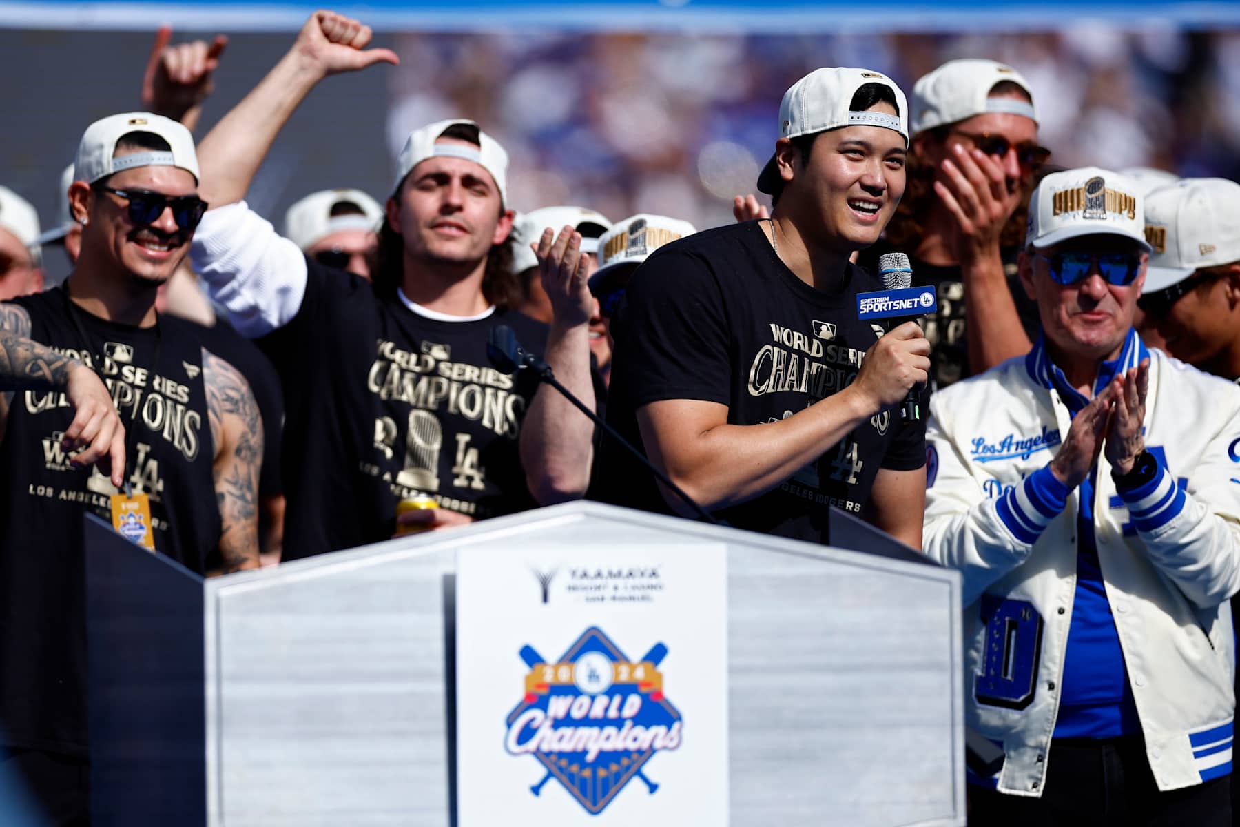 LOS ANGELES, CALIFORNIA - NOVEMBER 01: Shohei Ohtani #17 of the Los Angeles Dodgers speaks during the 2024 World Series Celebration Show at Dodger Stadium on November 01, 2024 in Los Angeles, California.  (Photo by Ronald Martinez/Getty Images)