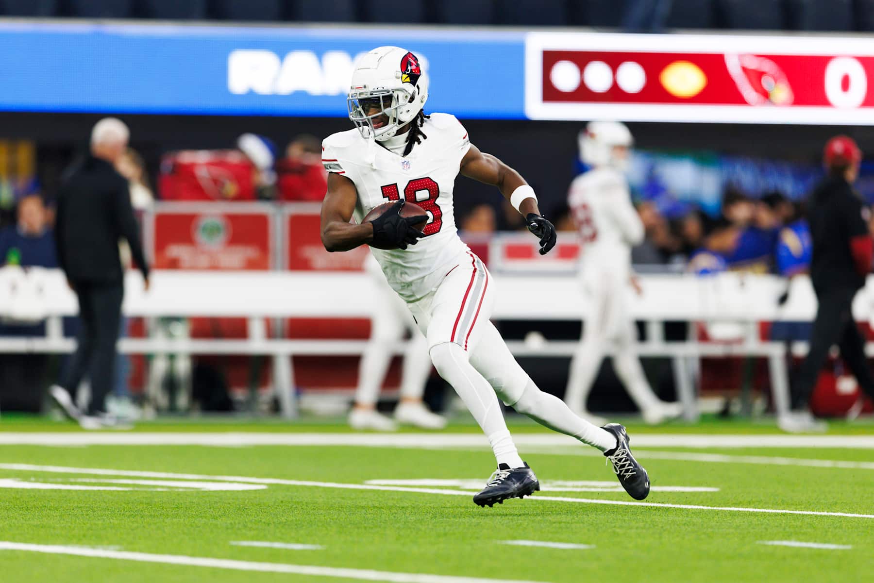 INGLEWOOD, CALIFORNIA - DECEMBER 28: Marvin Harrison Jr. #18 of the Arizona Cardinals runs after the catch before the game against the Los Angeles Rams at SoFi Stadium on December 28, 2024 in Inglewood, California. (Photo by Ric Tapia/Getty Images)