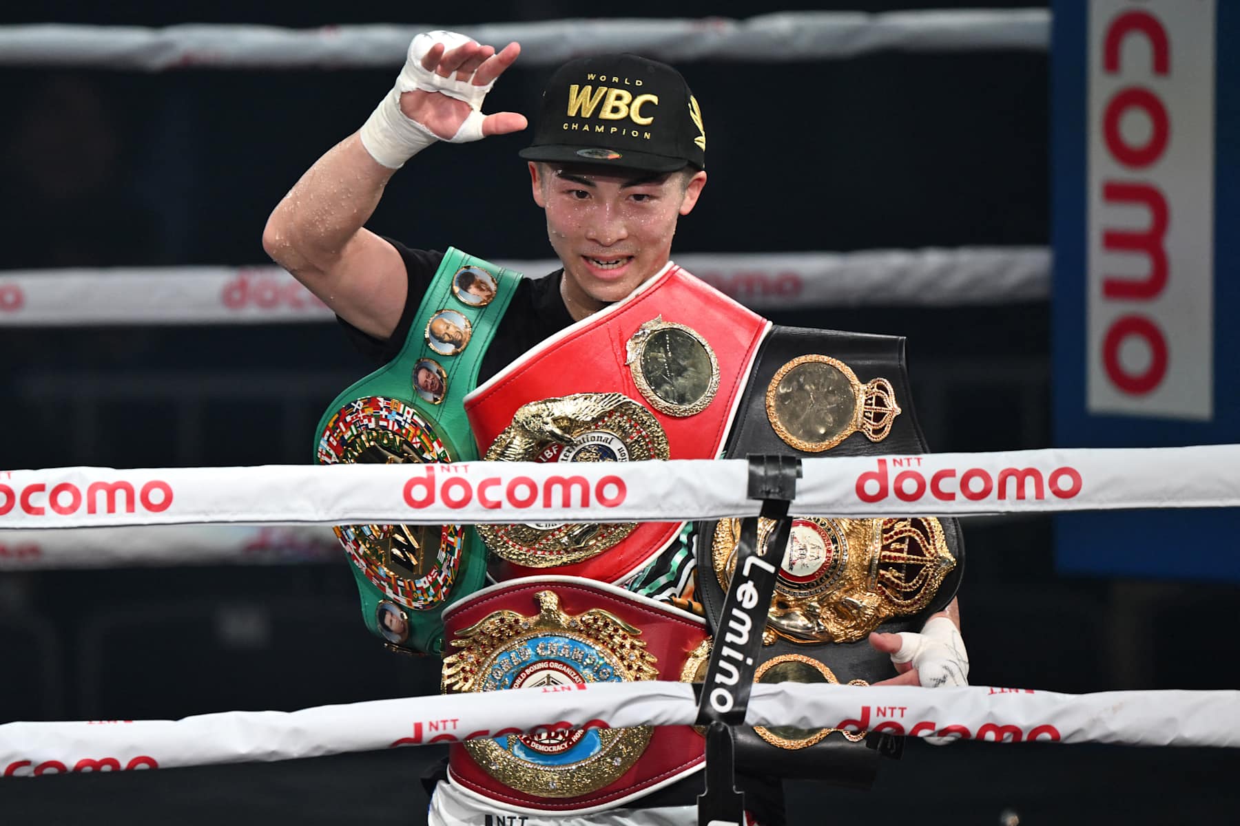 Japan's WBC and WBO super bantamweight champion Naoya Inoue celebrates his victory over Philippines' WBA and IBF super bantamweight champion Marlon Tapales after their four-belt world super bantamweight title unification match at Tokyo's Ariake Arena on December 26, 2023. (Photo by Kazuhiro NOGI / AFP) (Photo by KAZUHIRO NOGI/AFP via Getty Images)
