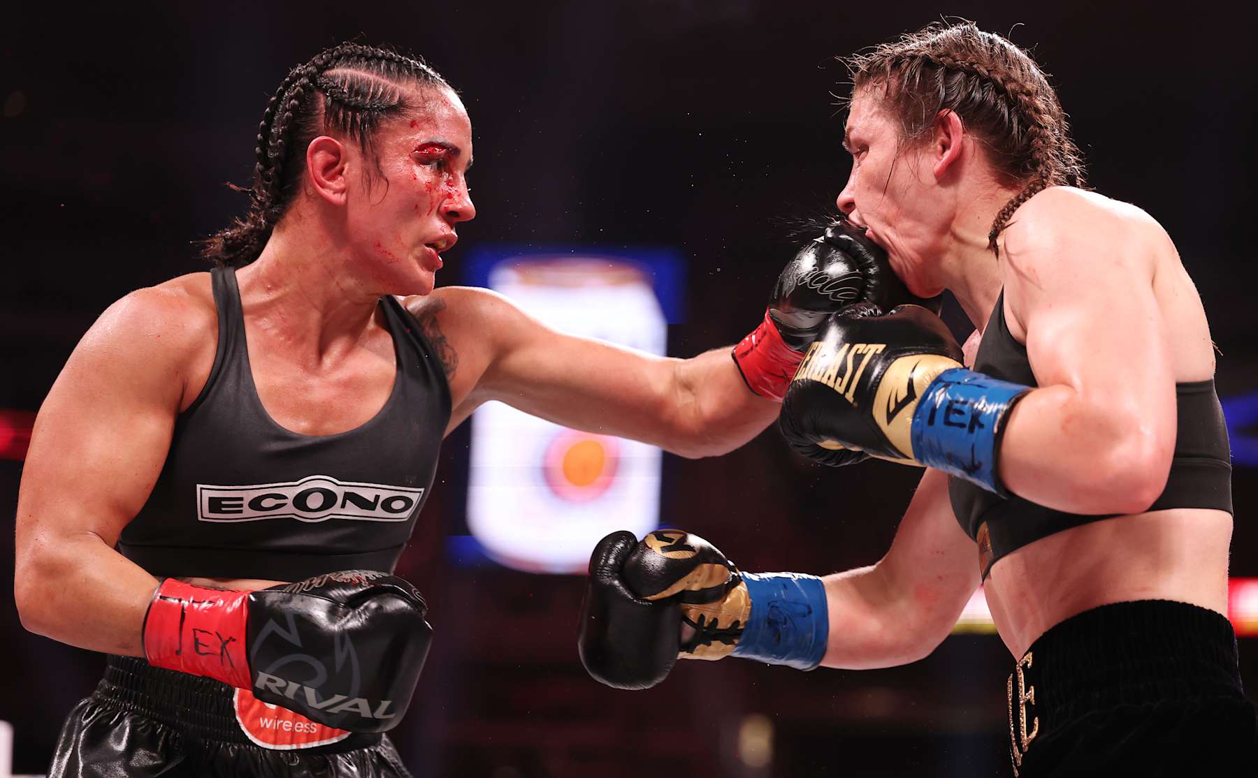 ARLINGTON, TEXAS - NOVEMBER 15: Amanda Serrano punches Katie Taylor during their fight LIVE On Netflix: Jake Paul vs. Mike Tyson at AT&T Stadium on November 15, 2024 in Arlington, Texas (Photo by Al Bello/Getty Images for Netflix © 2024)