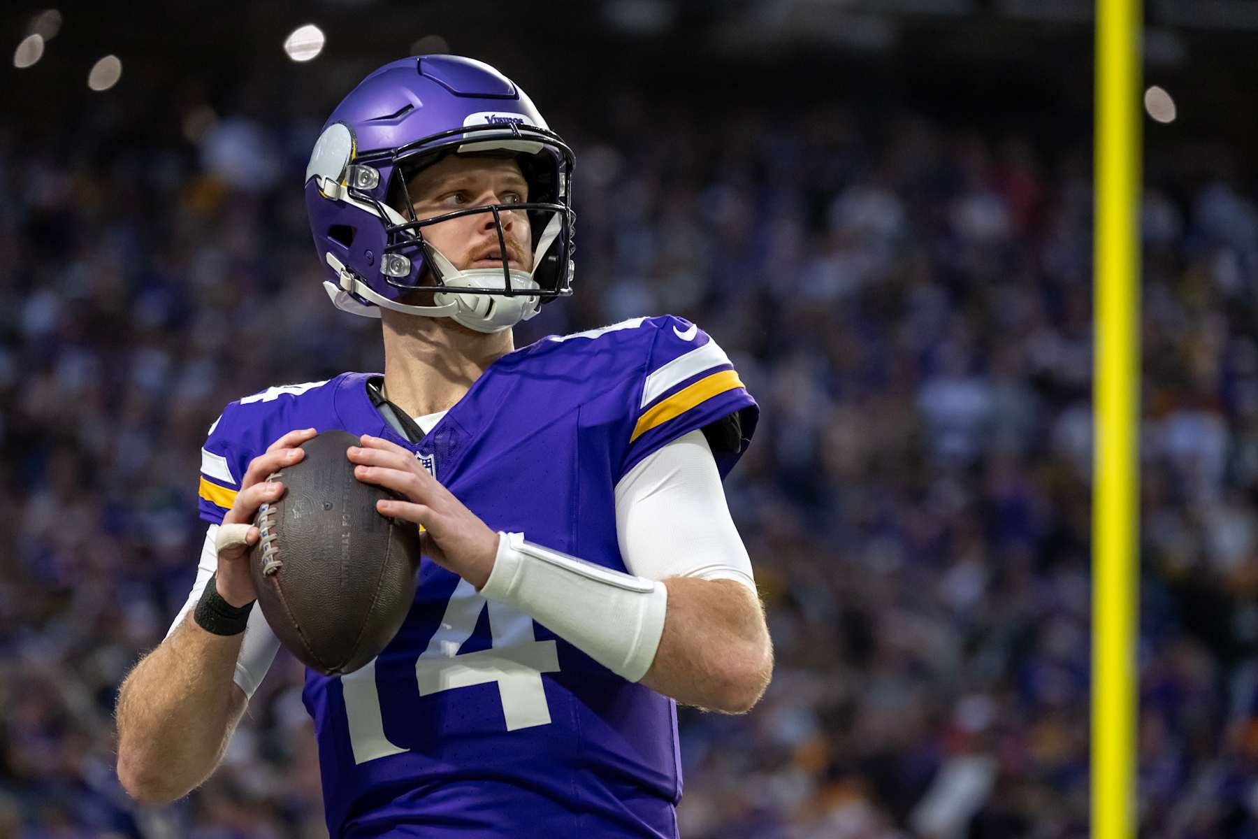 MINNEAPOLIS, MN - DECEMBER 29: Minnesota Vikings quarterback Sam Darnold (14) warms up before an NFL game between the Minnesota Vikings and Green Bay Packers on December 29, 2024, at U.S. Bank Stadium in Minneapolis, MN. (Photo by Nick Wosika/Icon Sportswire via Getty Images)