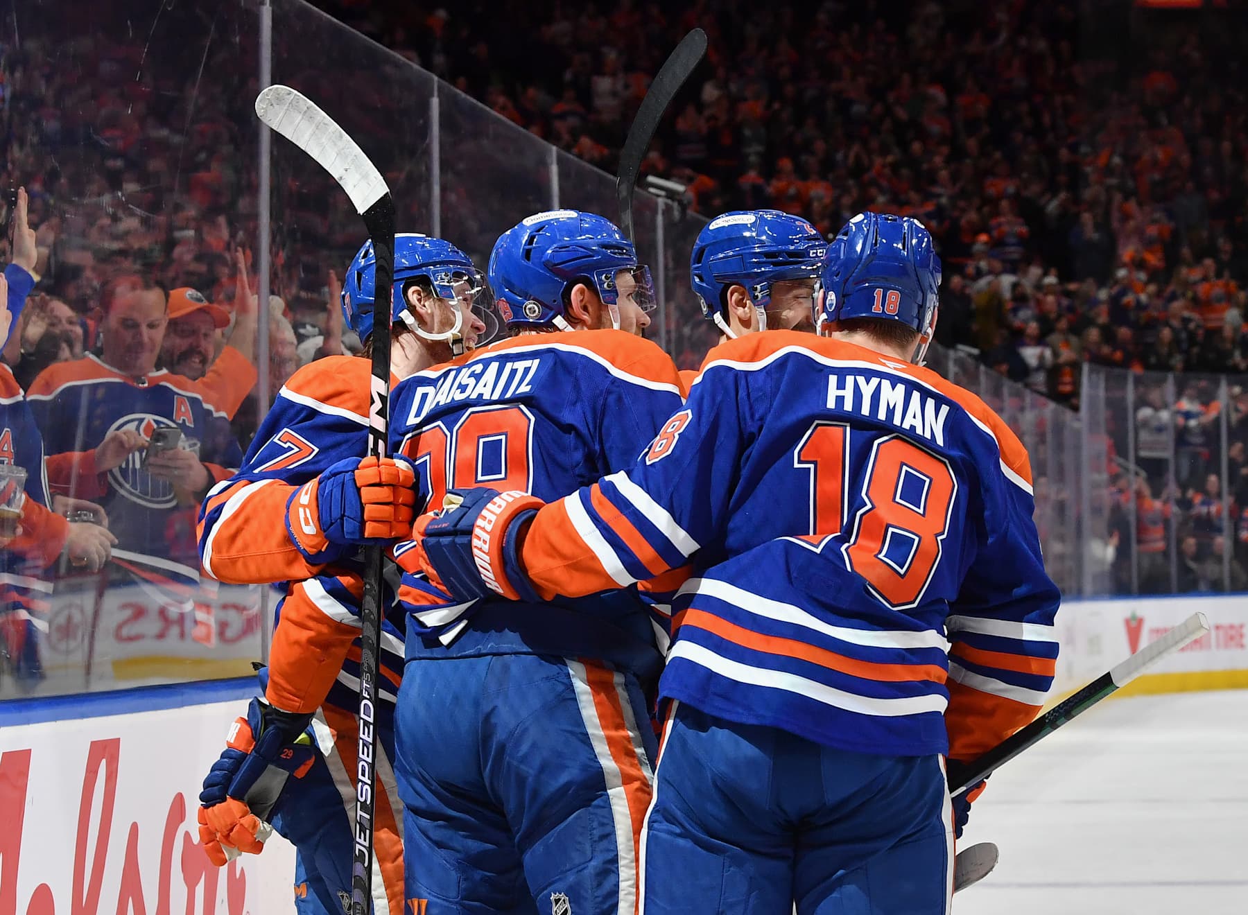 EDMONTON, CANADA - DECEMBER 10: Connor McDavid #97, Leon Draisaitl #29, Zach Hyman #18 and Evan Bouchard #2 of the Edmonton Oilers celebrate a first-period goal against the Tampa Bay Lightning during the game at Rogers Place on December 10, 2024, in Edmonton, Alberta, Canada. (Photo by Andy Devlin/NHLI via Getty Images)