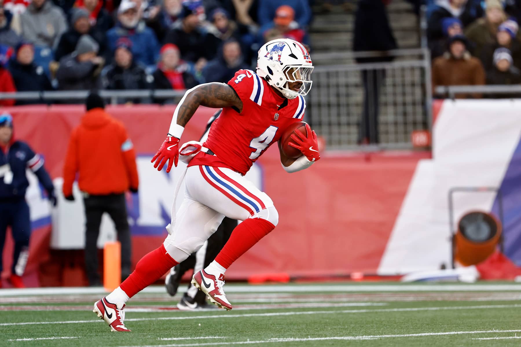 FOXBOROUGH, MA - DECEMBER 1: Antonio Gibson #4 of the New England Patriots runs the ball against the Indianapolis Colts during the first quarter at Gillette Stadium on December 1, 2024 in Foxborough, Massachusetts.(Photo By Winslow Townson/Getty Images)