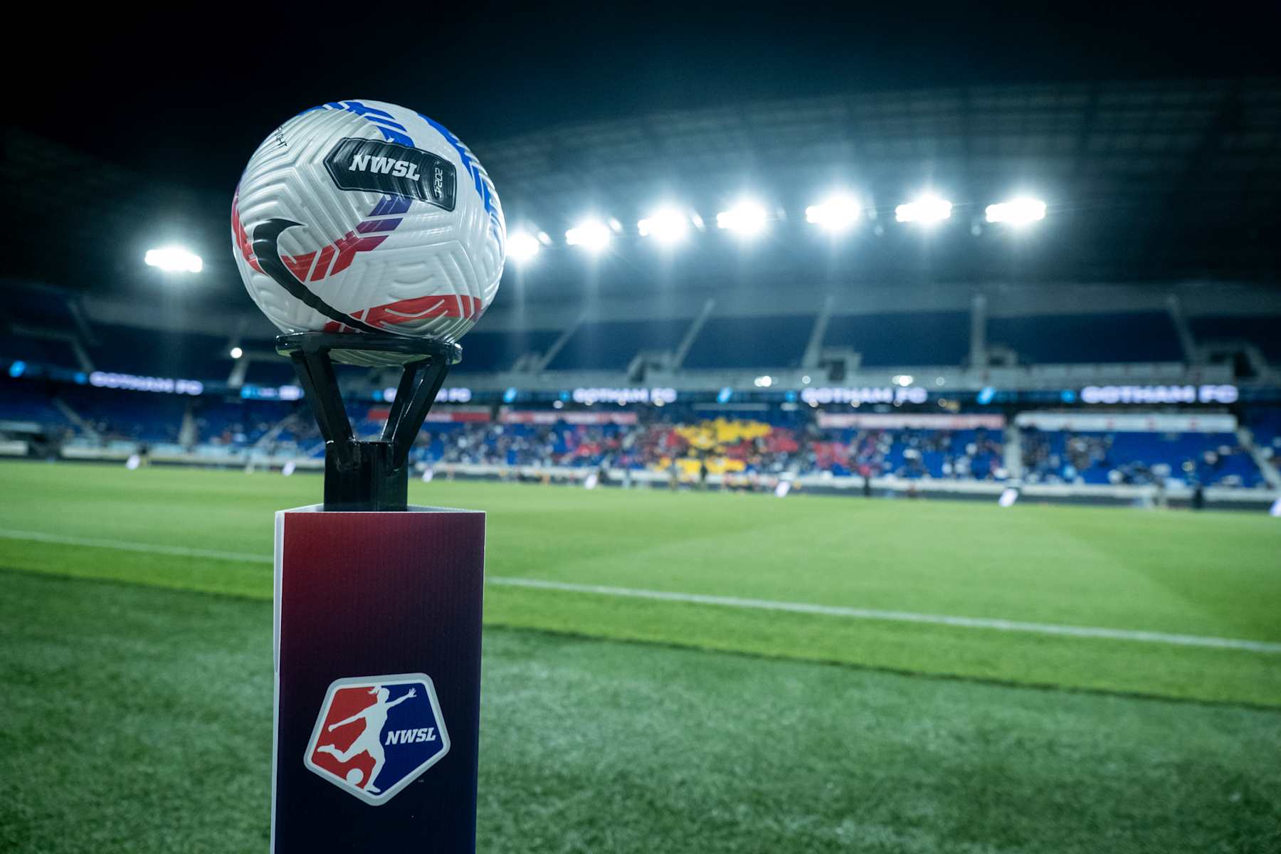 HARRISON, NEW JERSEY - MAY 04: The official NWSL game ball sits on top of a pedestal with the NWSL Logo on it with the stadium behind the ball at the start of the National Women's Soccer League match between NJ/NY Gotham FC and North Carolina Courage at Red Bull Arena on May 4, 2024 in Harrison, New Jersey. (Photo by Ira L. Black - Corbis/Getty Images)