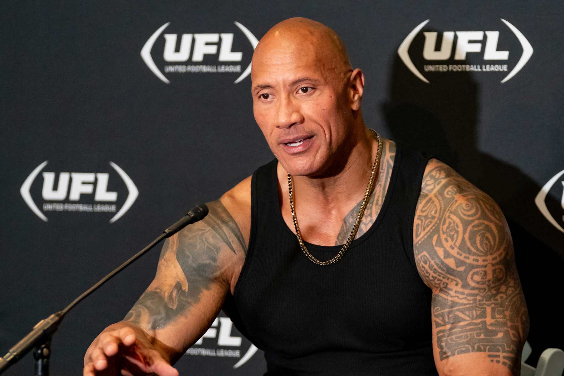 ARLINGTON, TX - MARCH 30:UFL owner Dwayne Johnson, The Rock, smiles during a press conference during a UFL game between the Birmingham Stallions and the Arlington Renegades on March 30, 2024 at Choctaw Stadium in Arlington, TX. (Photo by Chris Leduc/Icon Sportswire via Getty Images)