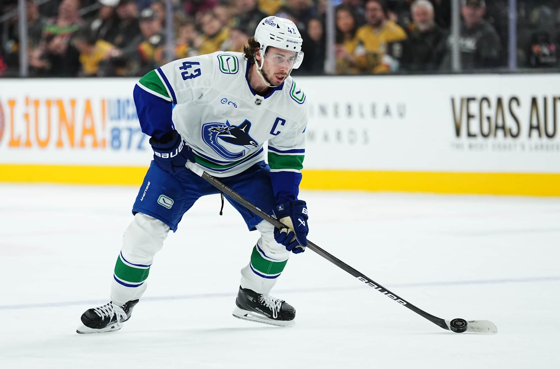 LAS VEGAS, NEVADA - DECEMBER 19: Quinn Hughes #43 of the Vancouver Canucks skates during the second period against the Vegas Golden Knights at T-Mobile Arena on December 19, 2024 in Las Vegas, Nevada. (Photo by Jeff Bottari/NHLI via Getty Images)