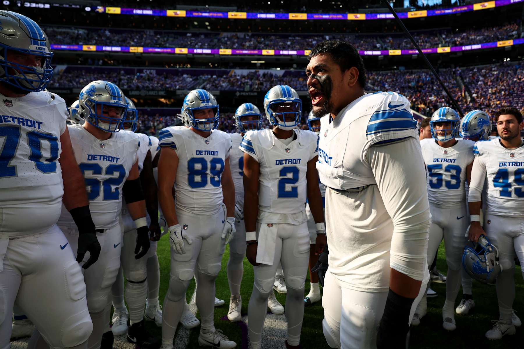 MINNEAPOLIS, MINNESOTA - OCTOBER 20: Penei Sewell #58 of the Detroit Lions gives a speech in the team huddle prior to an NFL football game against the Minnesota Vikings at U.S. Bank Stadium on October 20, 2024 in Minneapolis, Minnesota. (Photo by Kevin Sabitus/Getty Images)