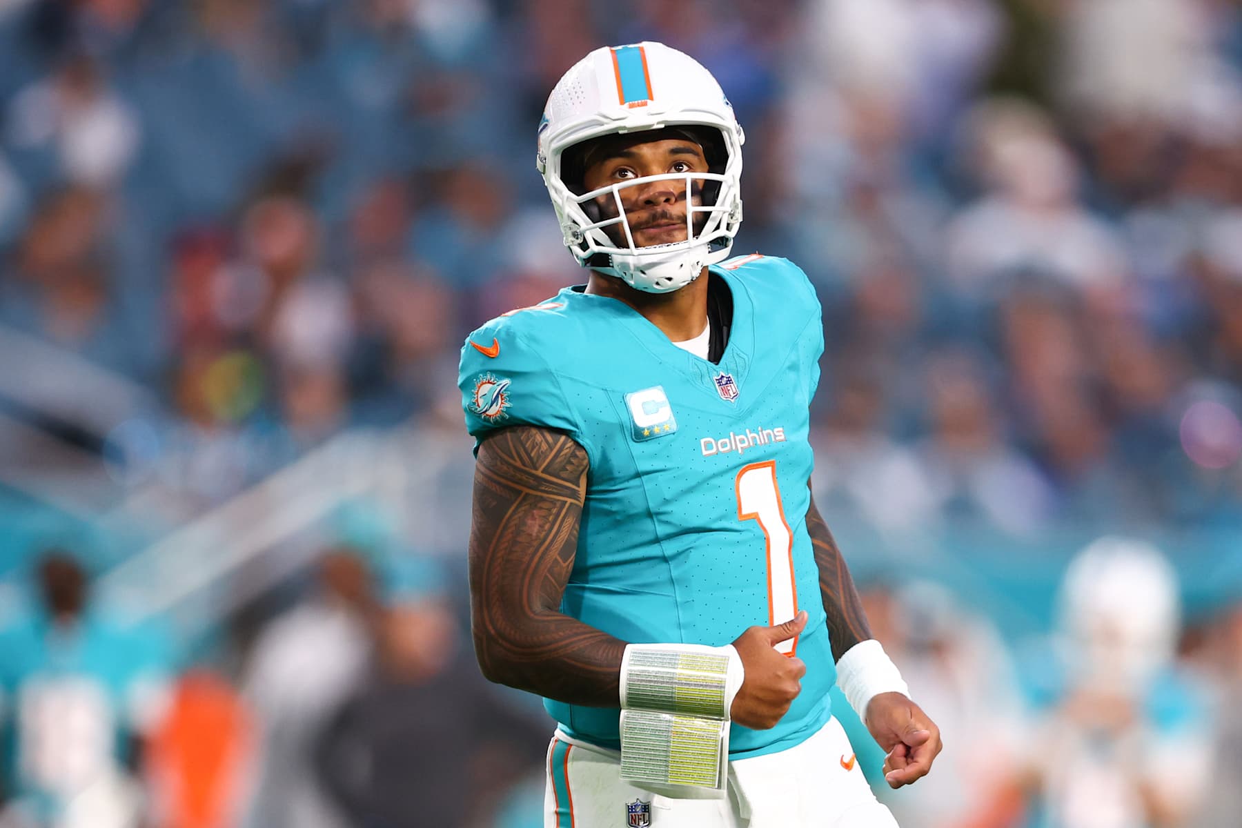 MIAMI GARDENS, FLORIDA - DECEMBER 22: Tua Tagovailoa #1 of the Miami Dolphins looks on against the San Francisco 49ers during the second half of the game at Hard Rock Stadium on December 22, 2024 in Miami Gardens, Florida. (Photo by Megan Briggs/Getty Images)