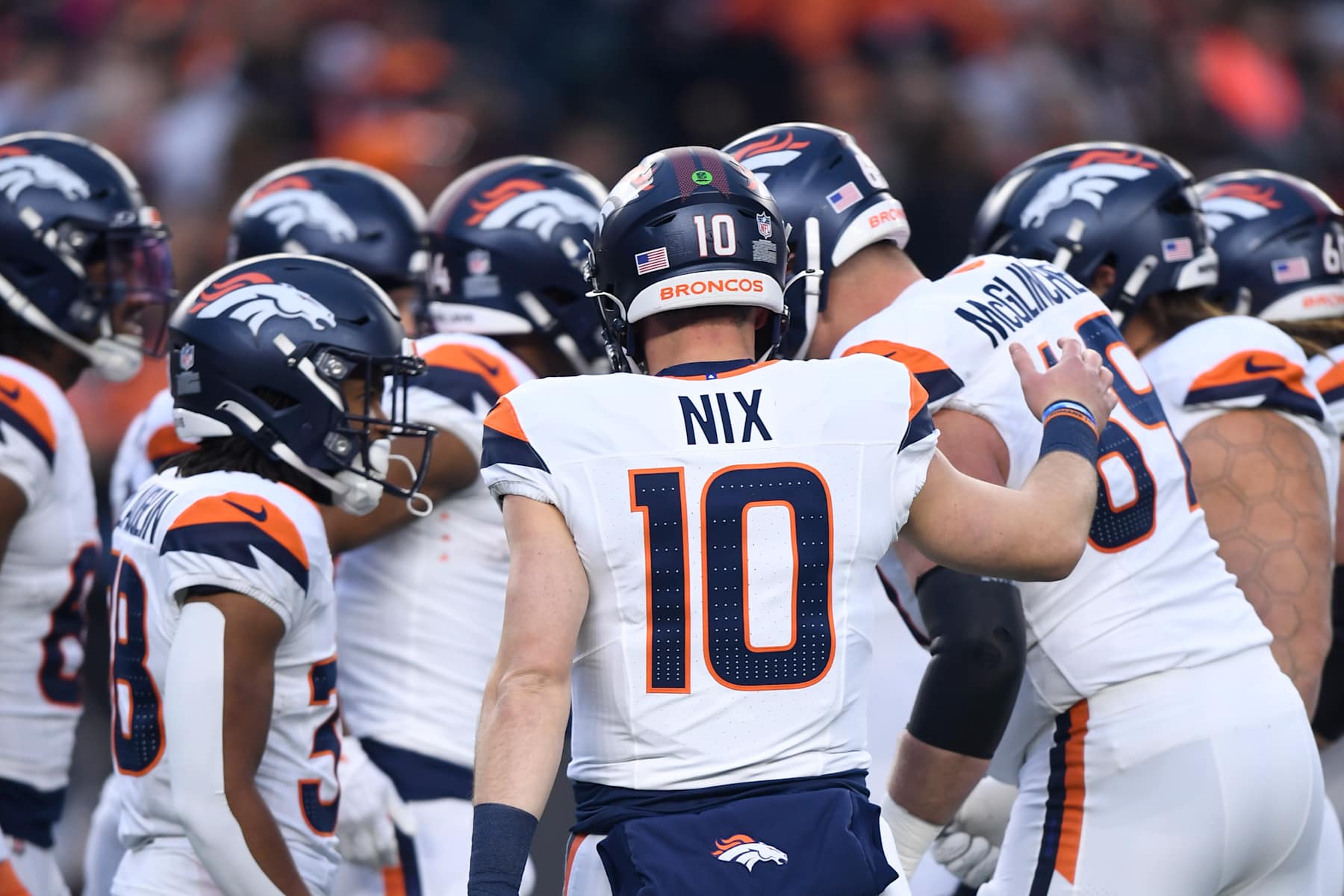 CINCINNATI, OH - DECEMBER 28: Denver Broncos Quarterback Bo Nix (10) huddles with his team during the NFL football game between the Denver Broncos and the Cincinnati Bengals on December 28, 2024, at Paycor Stadium in Cincinnati, Ohio. (Photo by Michael Allio/Icon Sportswire via Getty Images)